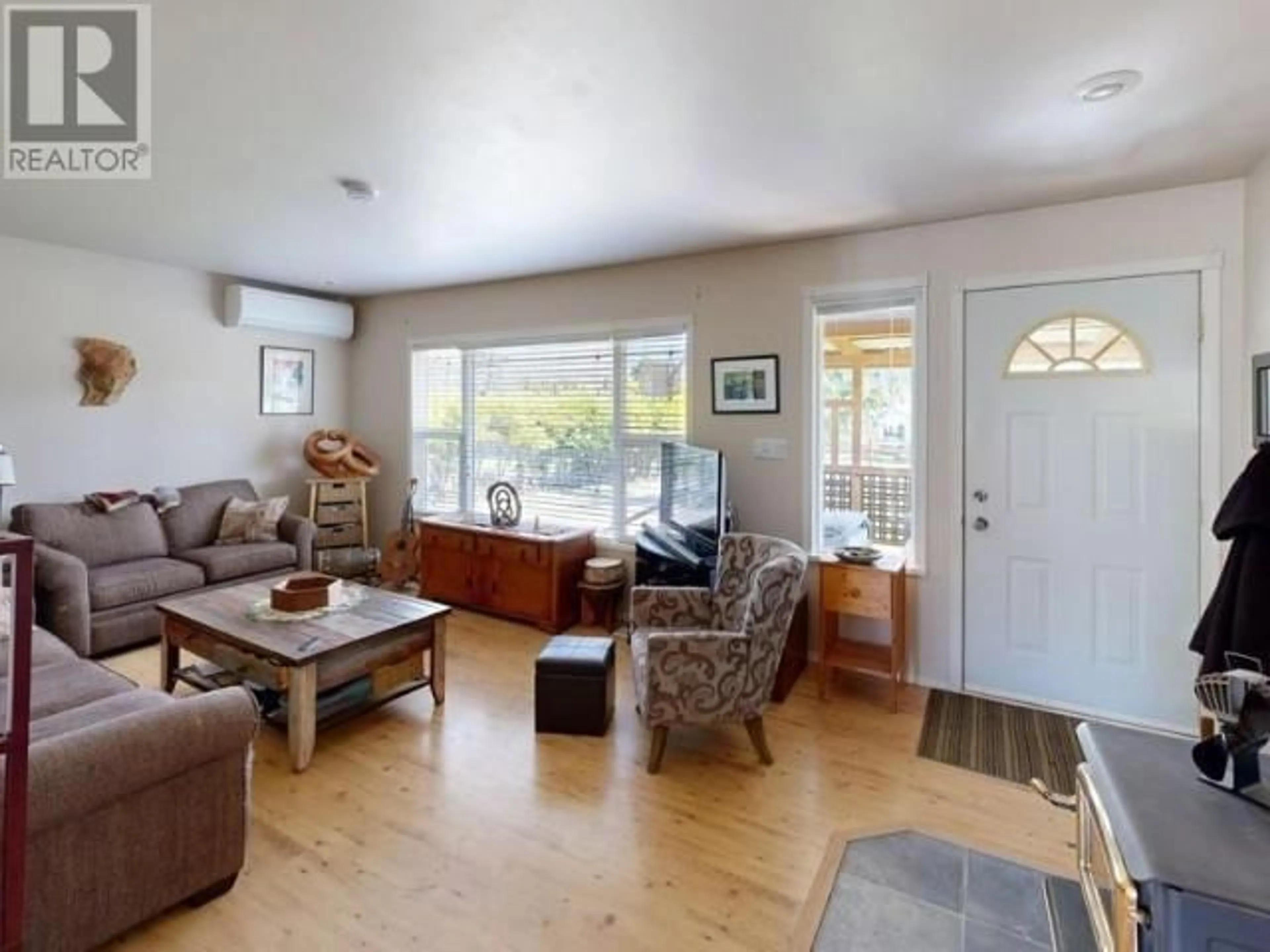 Living room with furniture, wood/laminate floor for 4769 BALSAM STREET, Texada Island British Columbia