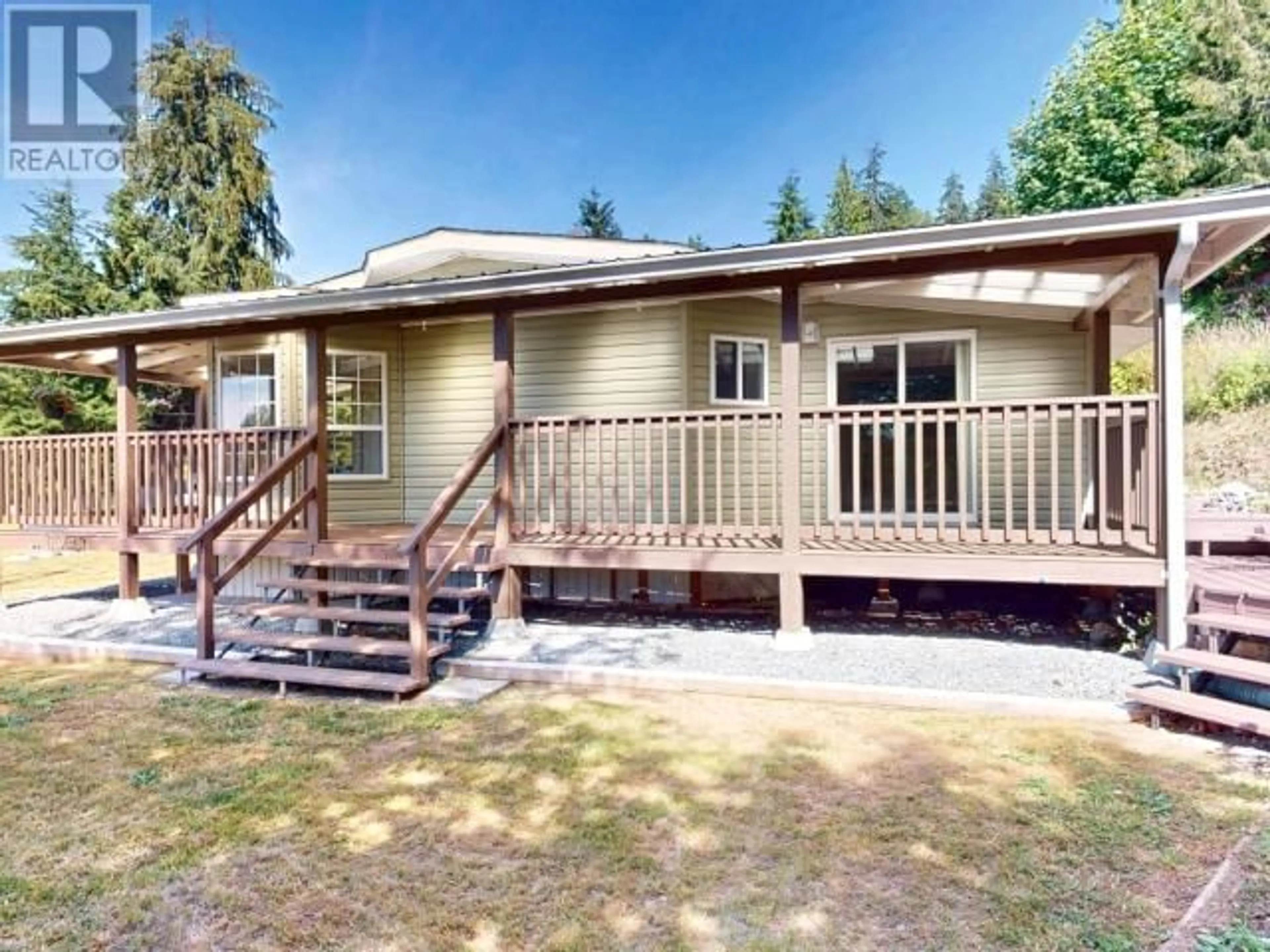 Home with vinyl exterior material, street for 7310 GODDARD STREET, Powell River British Columbia V8A5N7