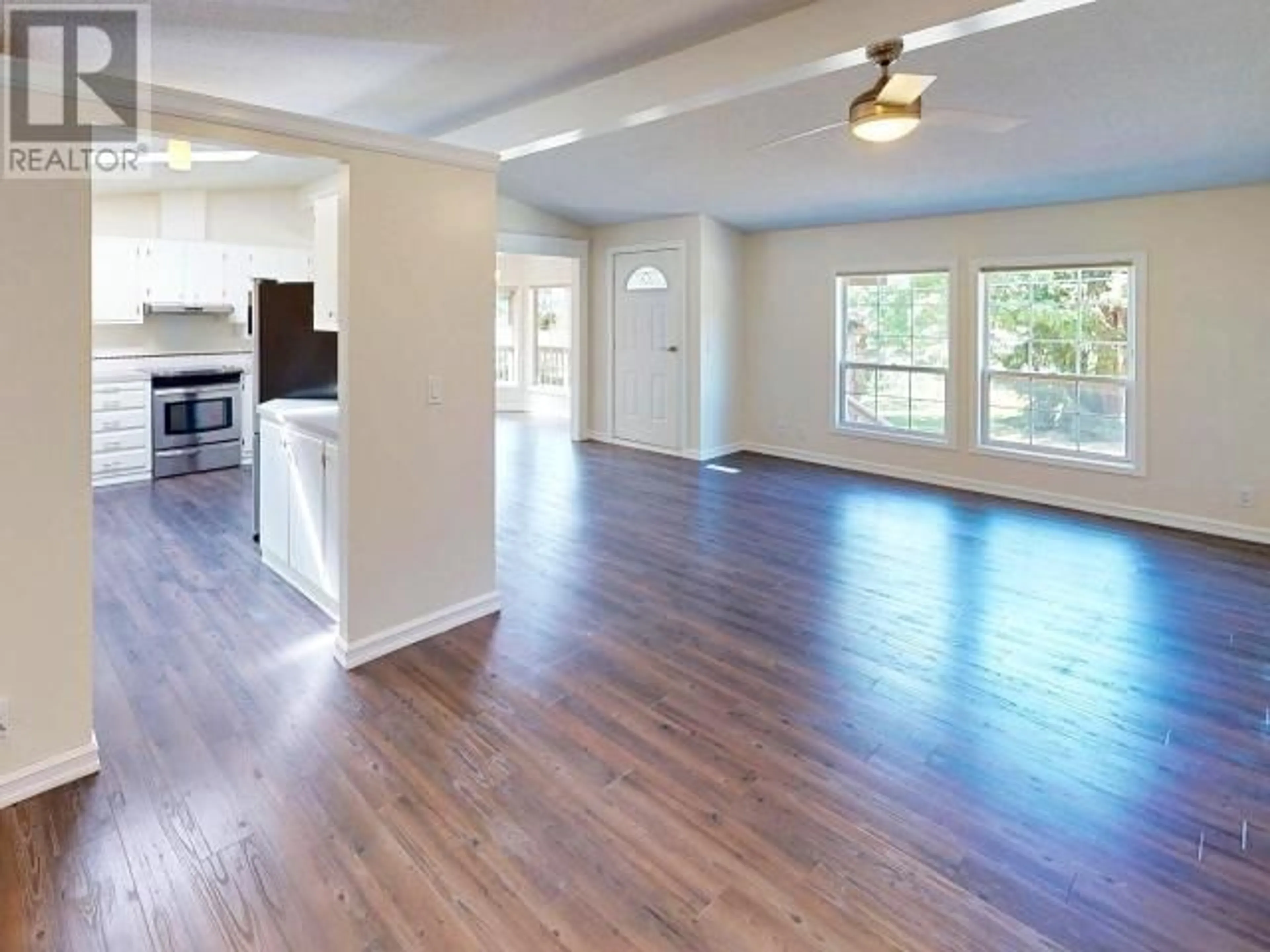 Open concept kitchen, wood/laminate floor for 7310 GODDARD STREET, Powell River British Columbia V8A5N7