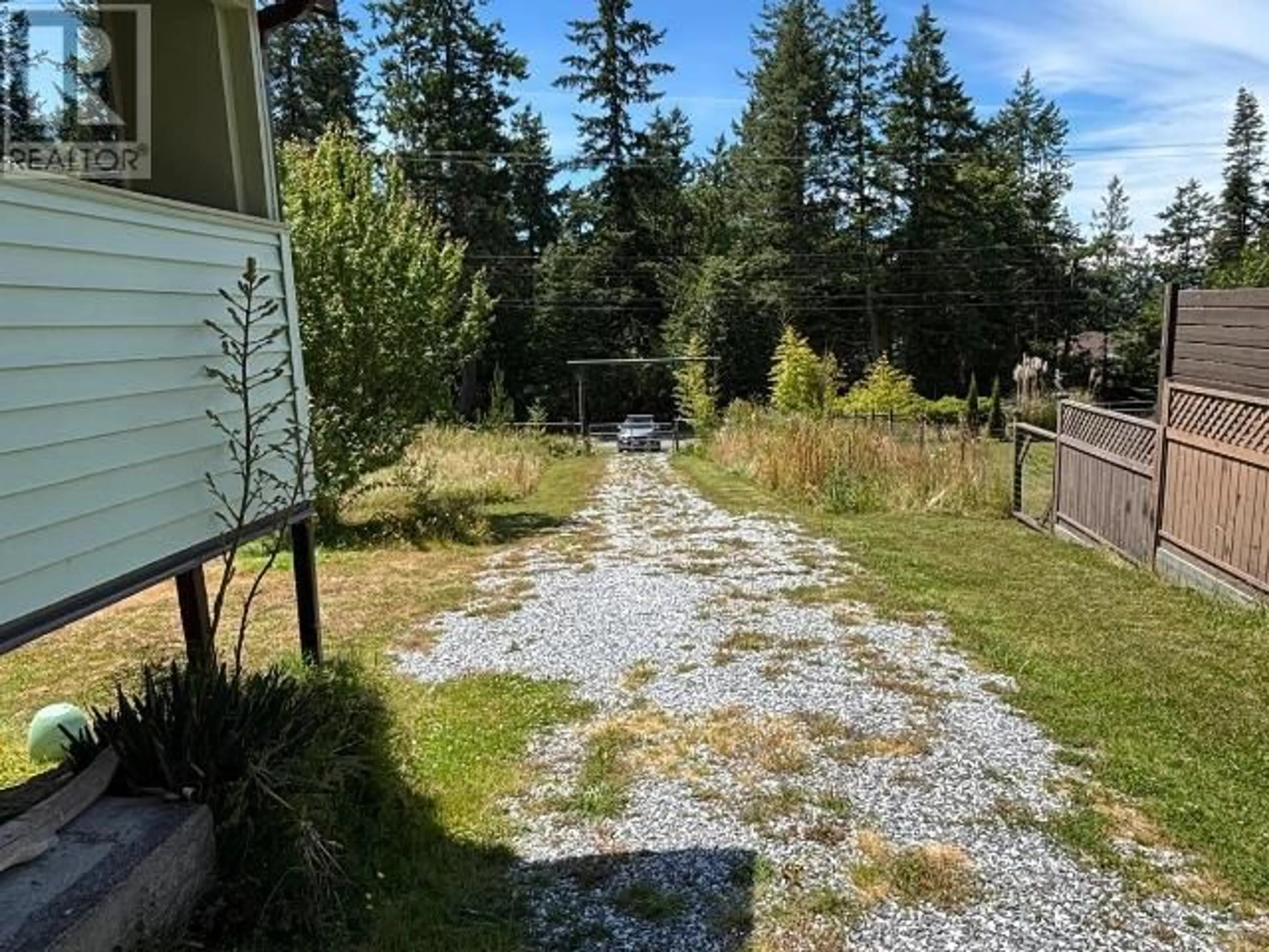 A pic from outside/outdoor area/front of a property/back of a property/a pic from drone, forest/trees view for 5843 GILLIES BAY RD, Texada Island British Columbia V0N3K0