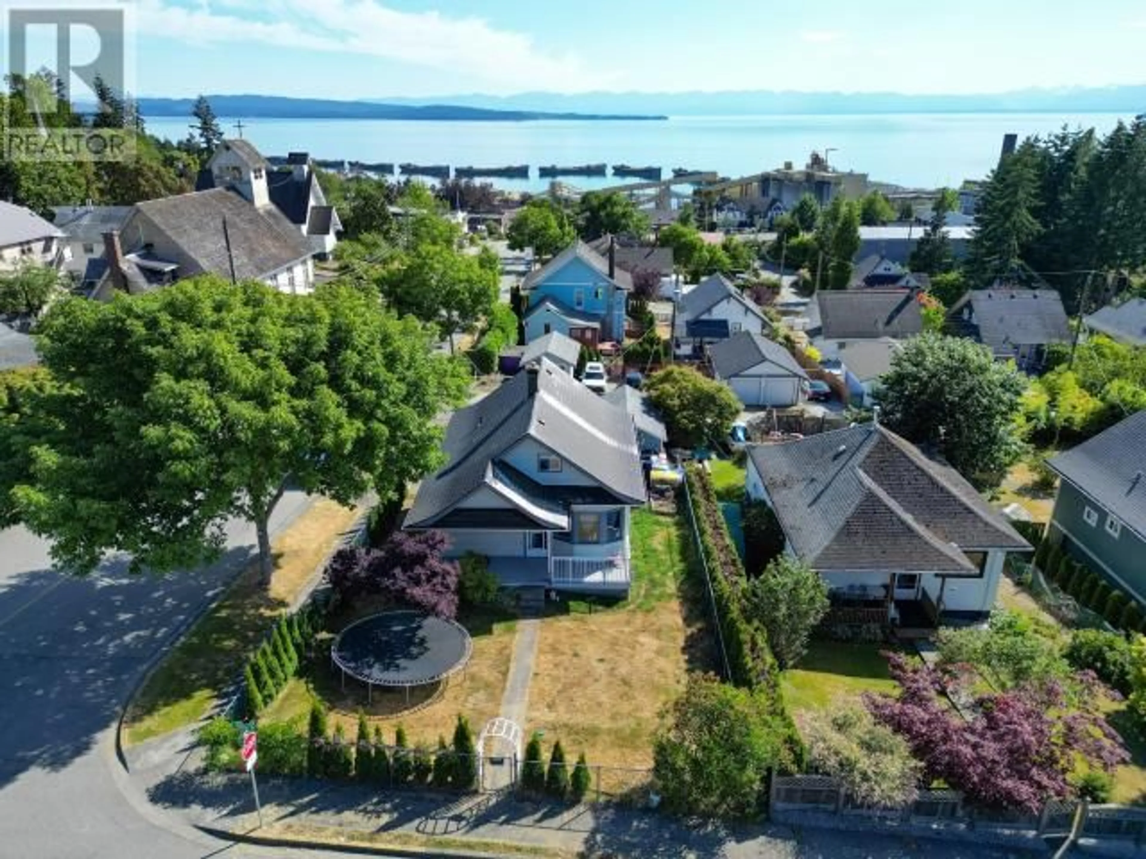 A pic from outside/outdoor area/front of a property/back of a property/a pic from drone, water/lake/river/ocean view for 6304 POPLAR STREET, Powell River British Columbia V8A4L2