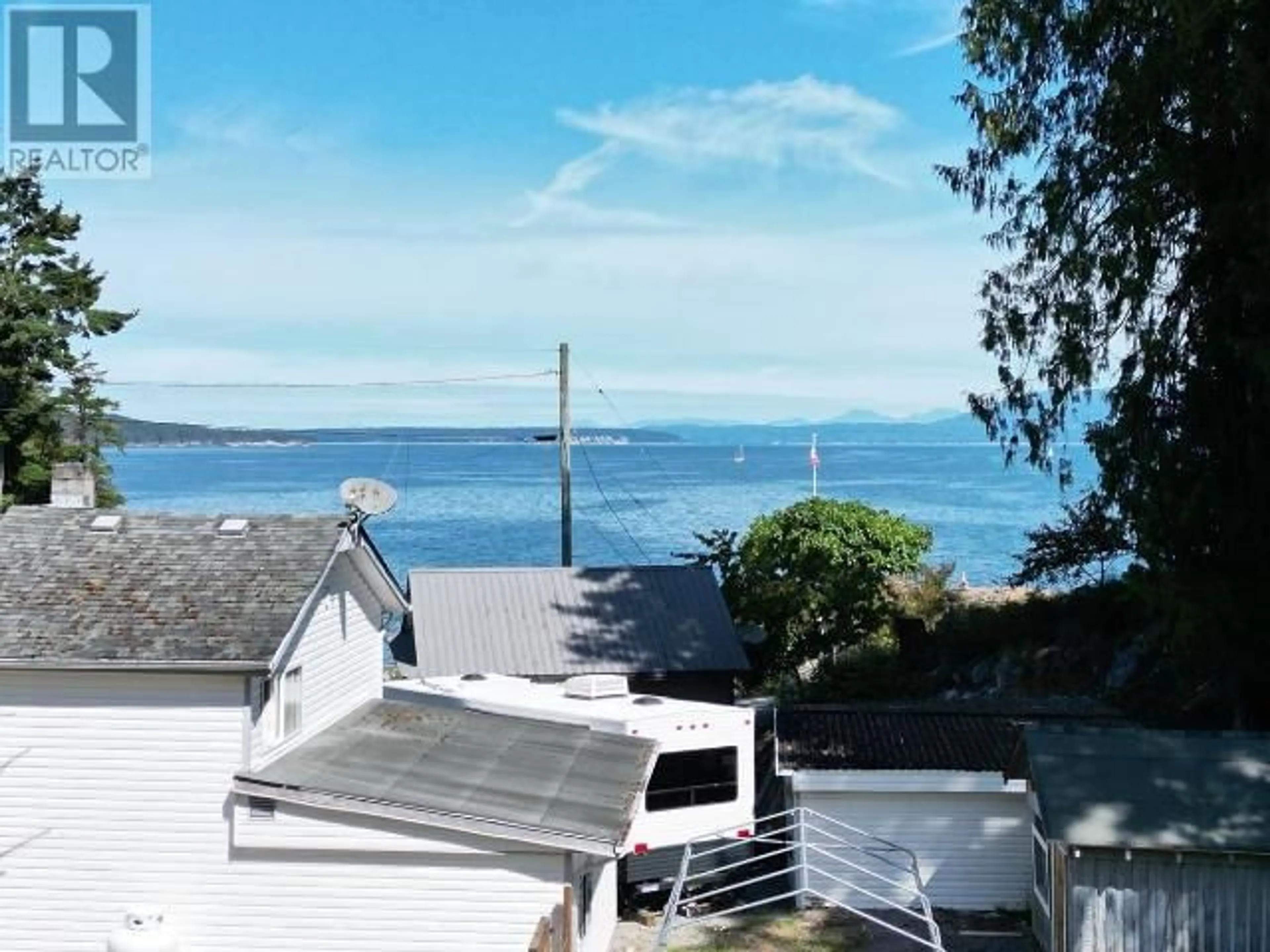 A pic from outside/outdoor area/front of a property/back of a property/a pic from drone, water/lake/river/ocean view for 2545 SMELTER AVE, Texada Island British Columbia