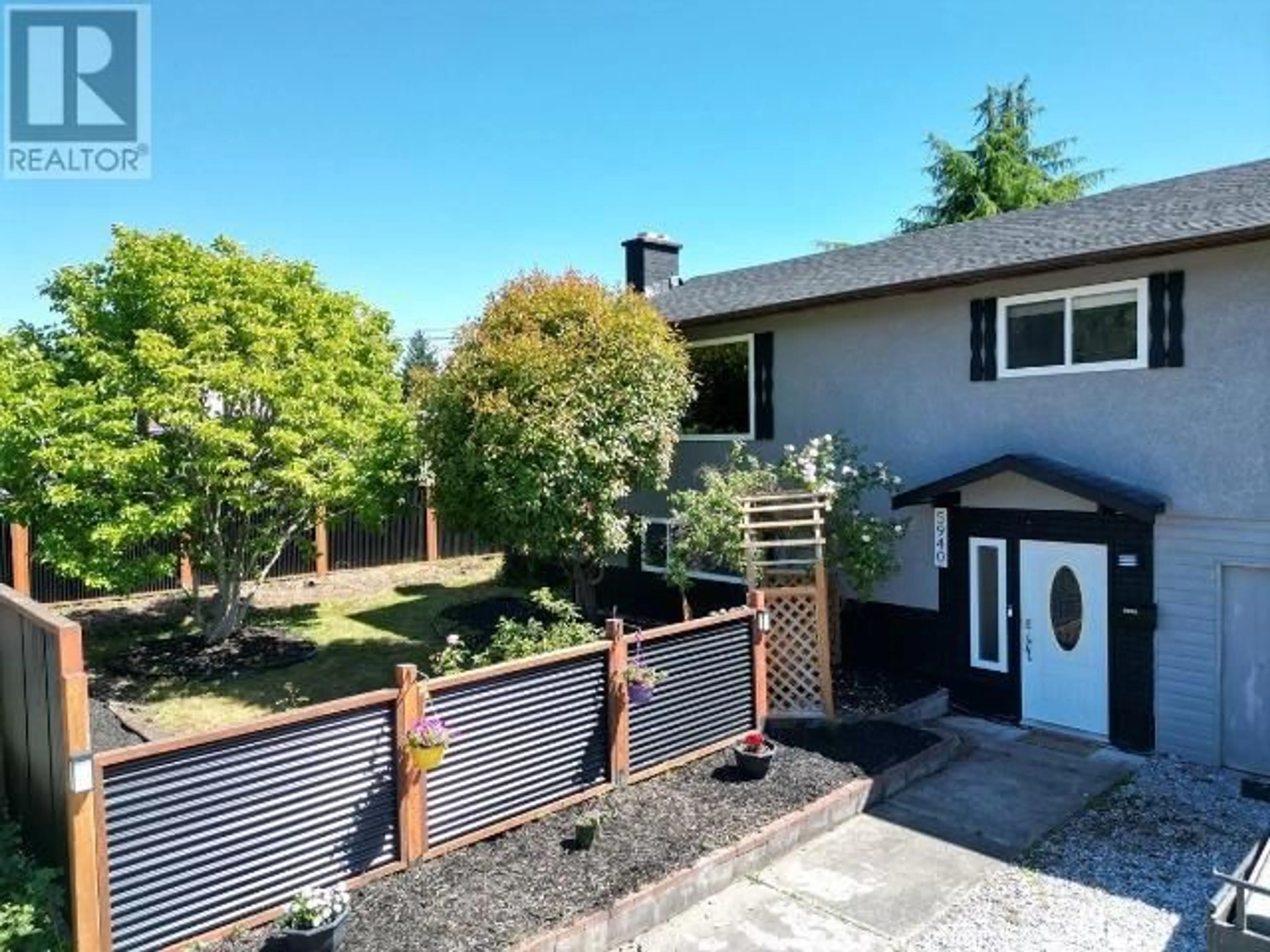 A pic from outside/outdoor area/front of a property/back of a property/a pic from drone, street for 5940 NASS STREET, Powell River British Columbia