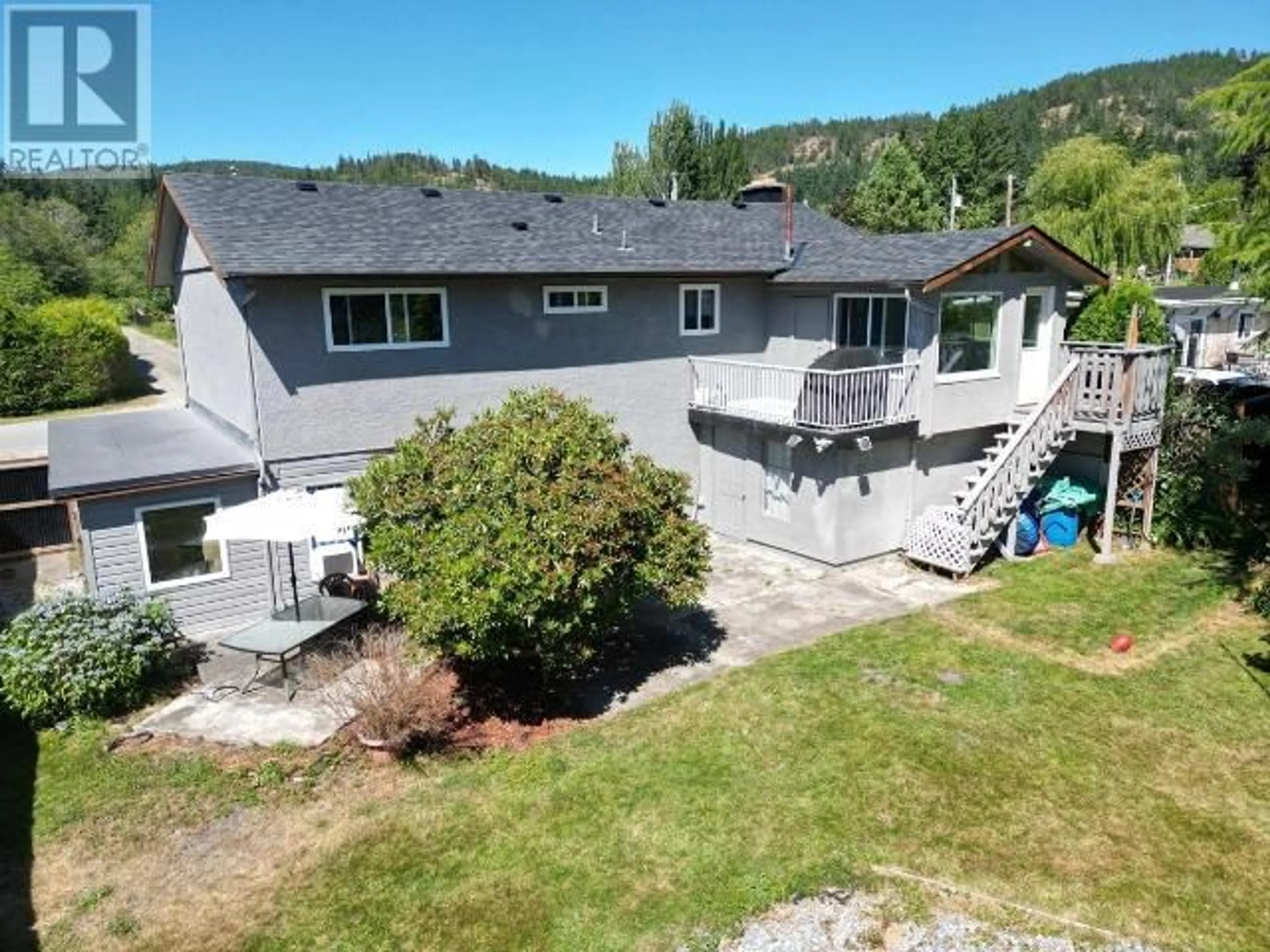A pic from outside/outdoor area/front of a property/back of a property/a pic from drone, mountain view for 5940 NASS STREET, Powell River British Columbia