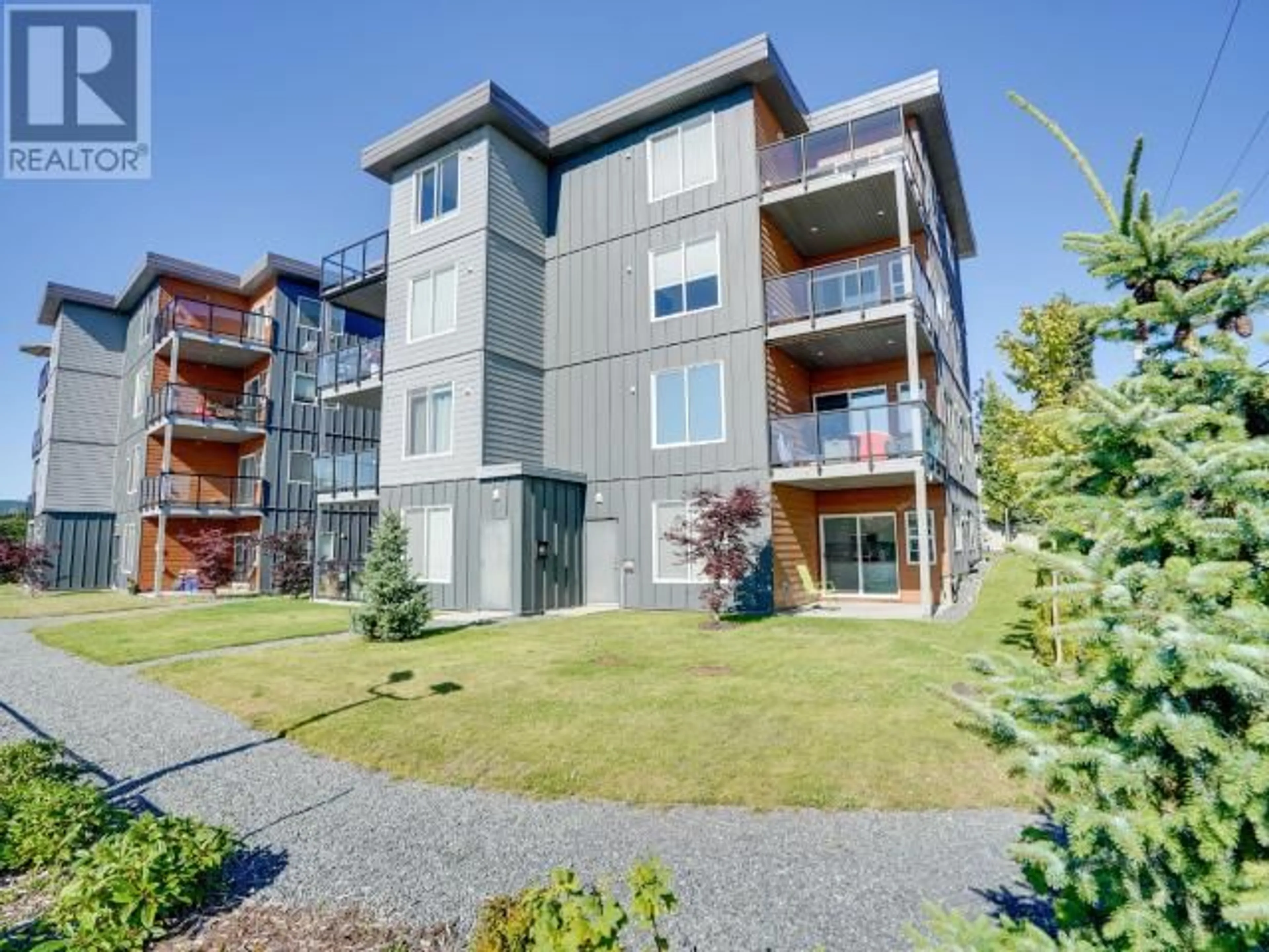 A pic from outside/outdoor area/front of a property/back of a property/a pic from drone, building for 401 - 7175 DUNCAN STREET, Powell River British Columbia V8A1W3
