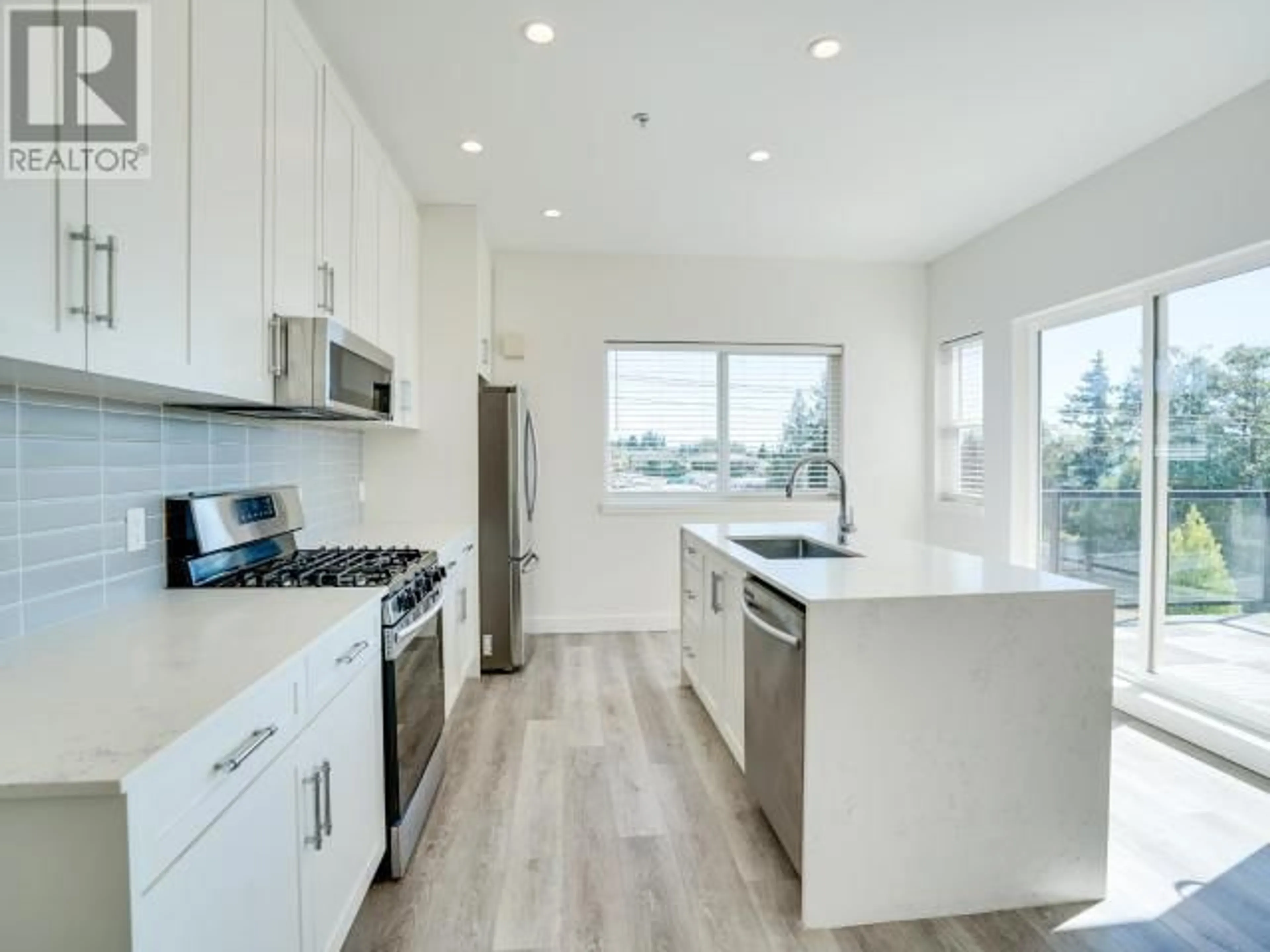 Open concept kitchen, unknown for 401 - 7175 DUNCAN STREET, Powell River British Columbia V8A1W3