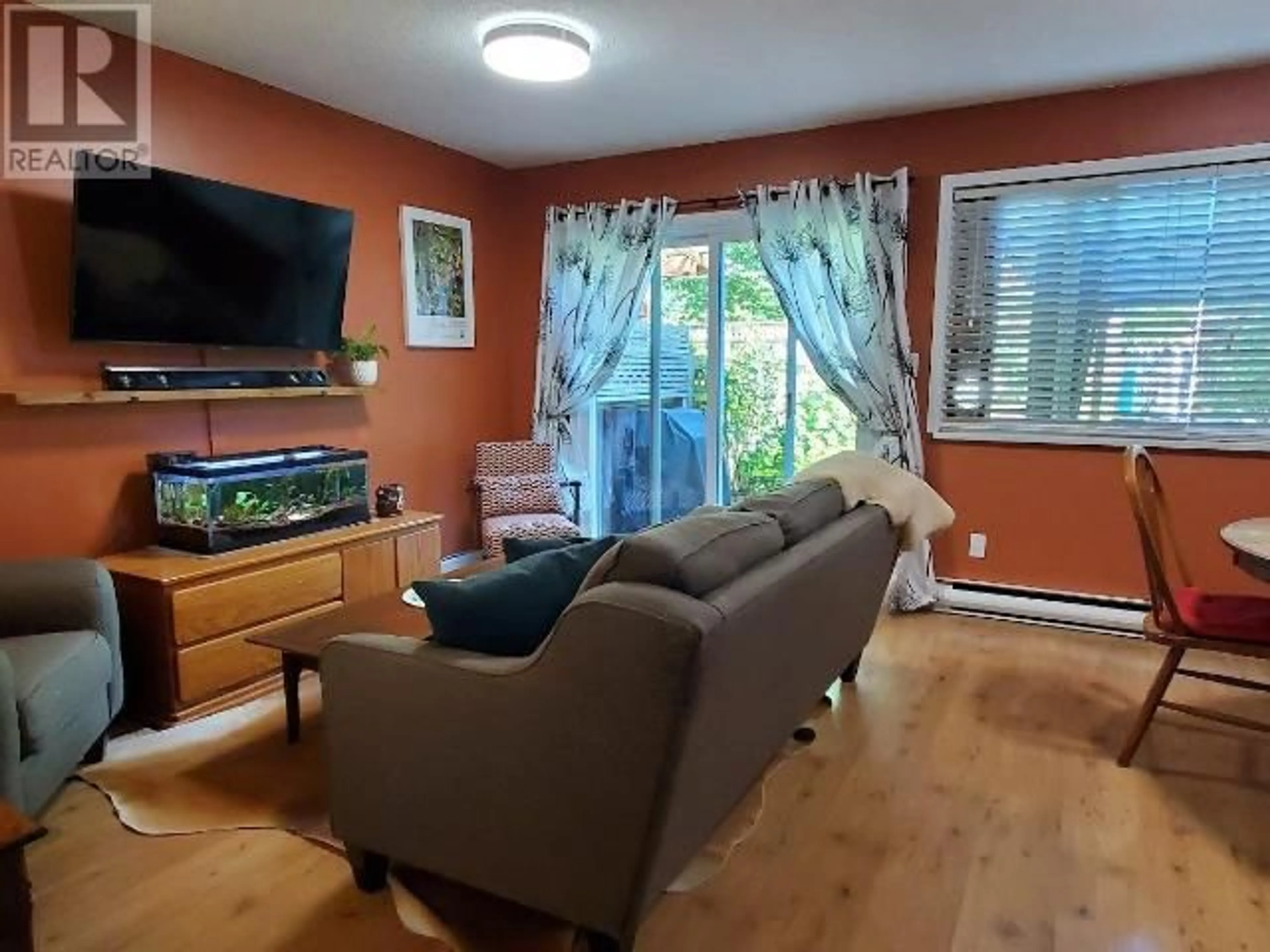 Living room with furniture, wood/laminate floor for 12147 FABER CRES, Out of Board Area British Columbia V2X8A1