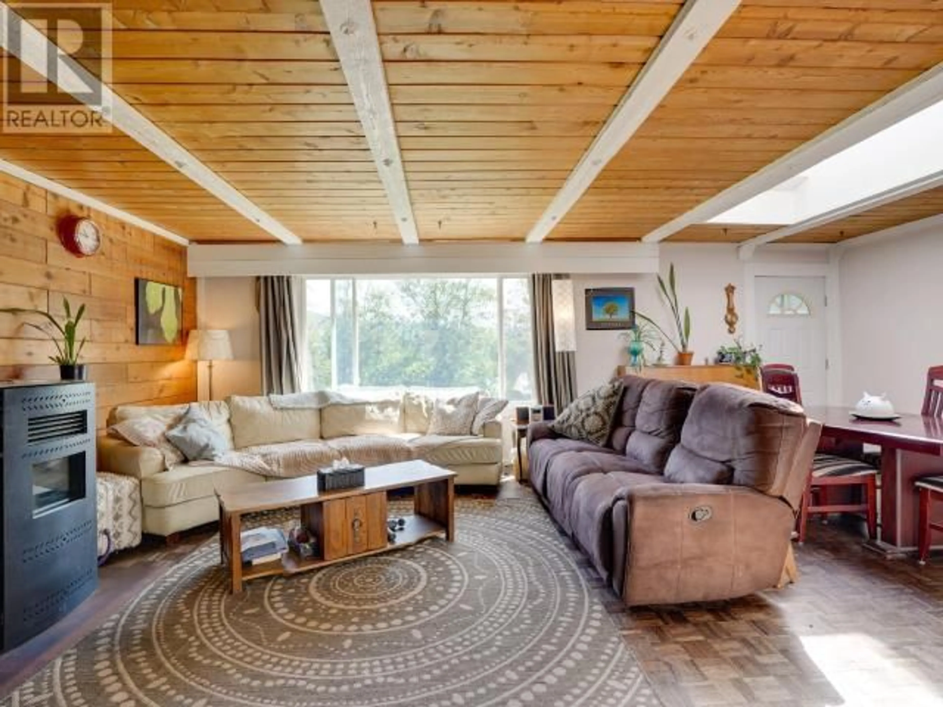 Living room with furniture, wood/laminate floor for 3008 ASH STREET, Texada Island British Columbia V0N1W0