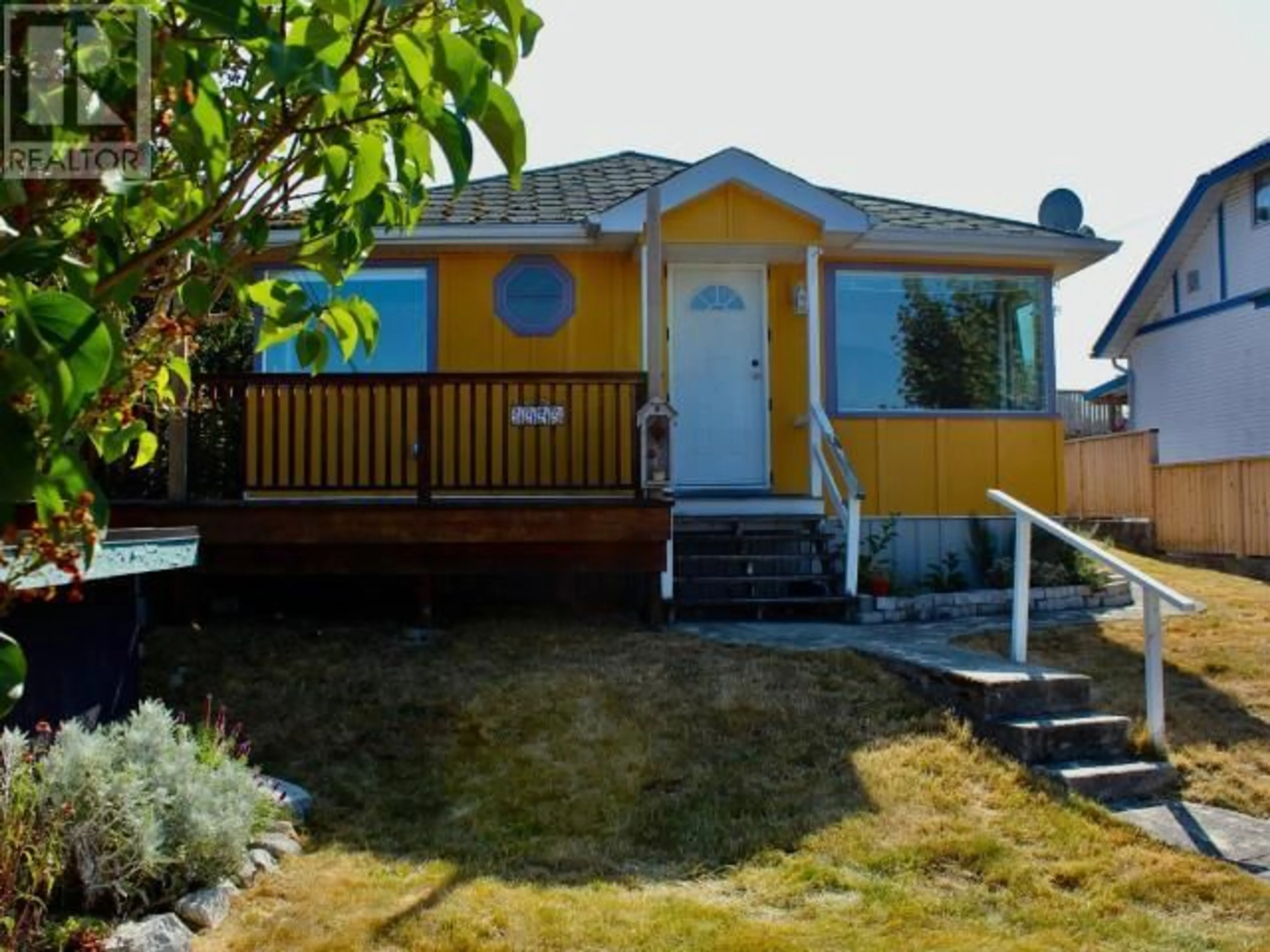 Home with vinyl exterior material, street for 4444 OMINECA AVE, Powell River British Columbia V8A2P7