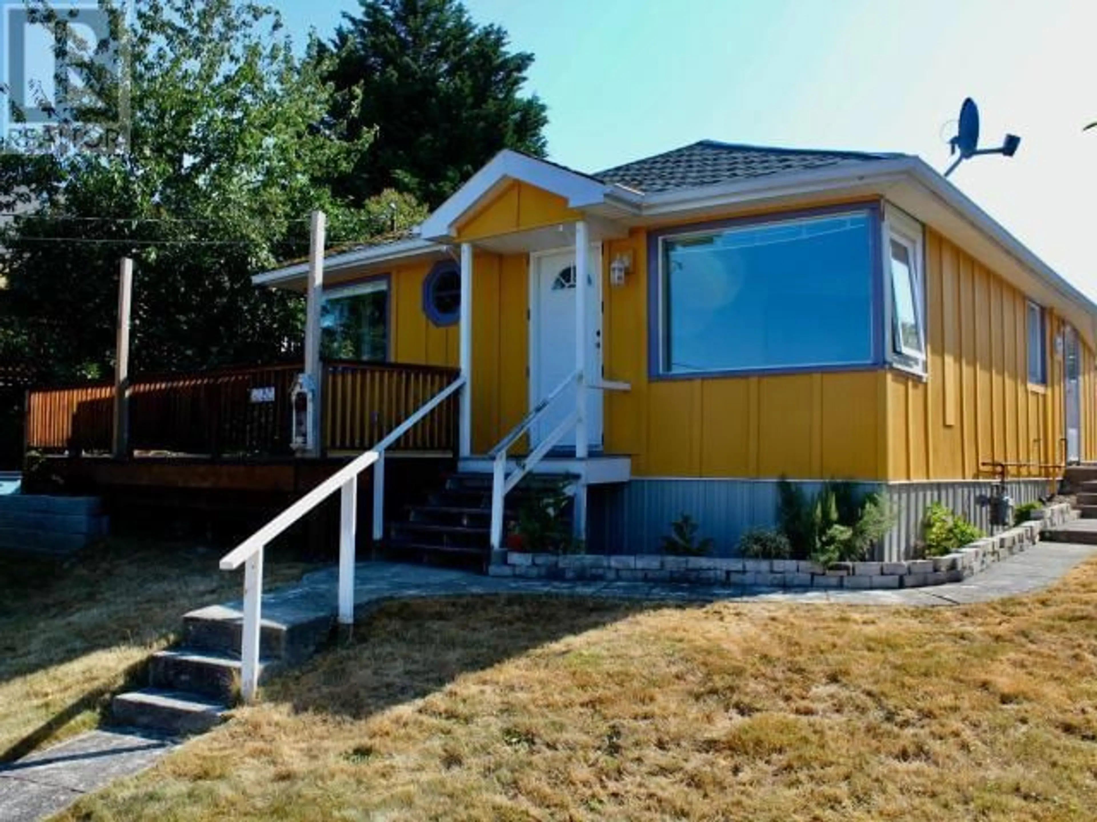 Home with vinyl exterior material, street for 4444 OMINECA AVE, Powell River British Columbia V8A2P7