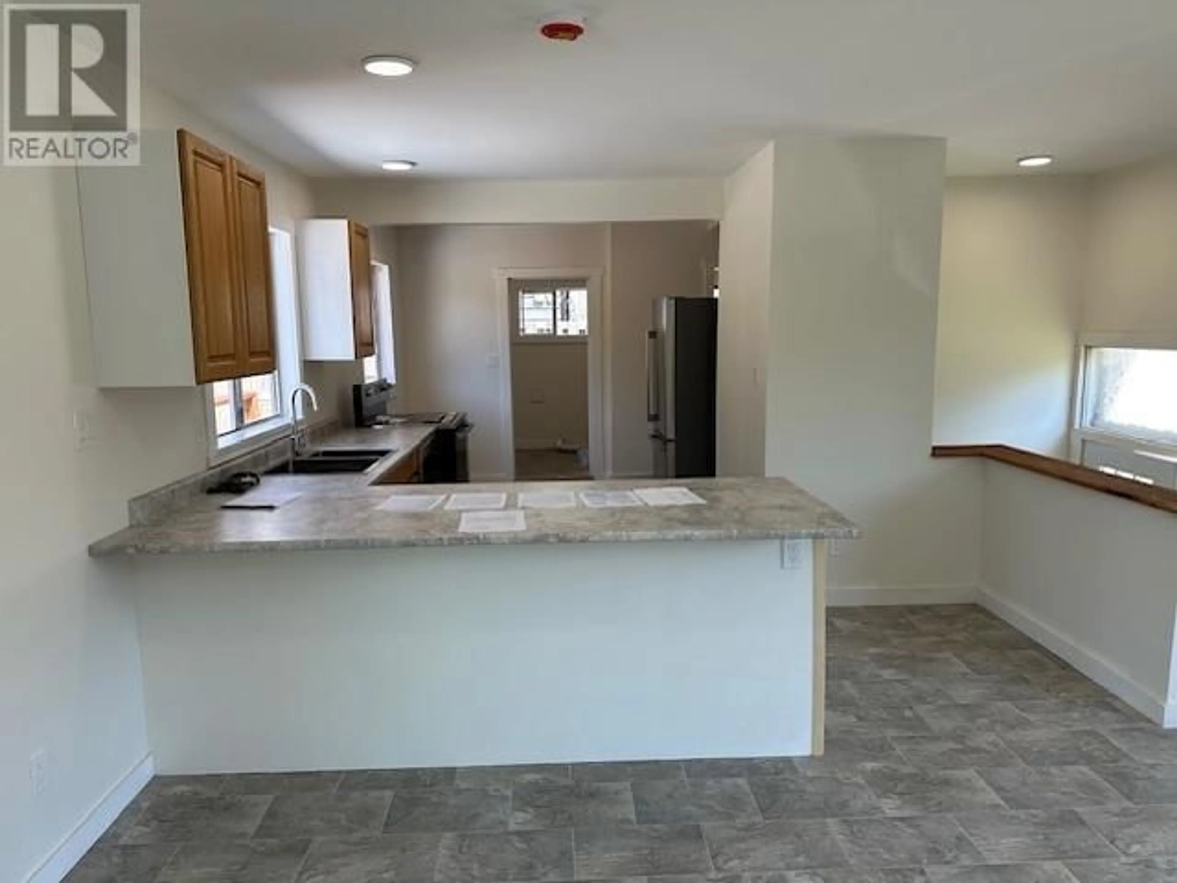 Open concept kitchen, ceramic/tile floor for 5593 NELSON AVE, Powell River British Columbia