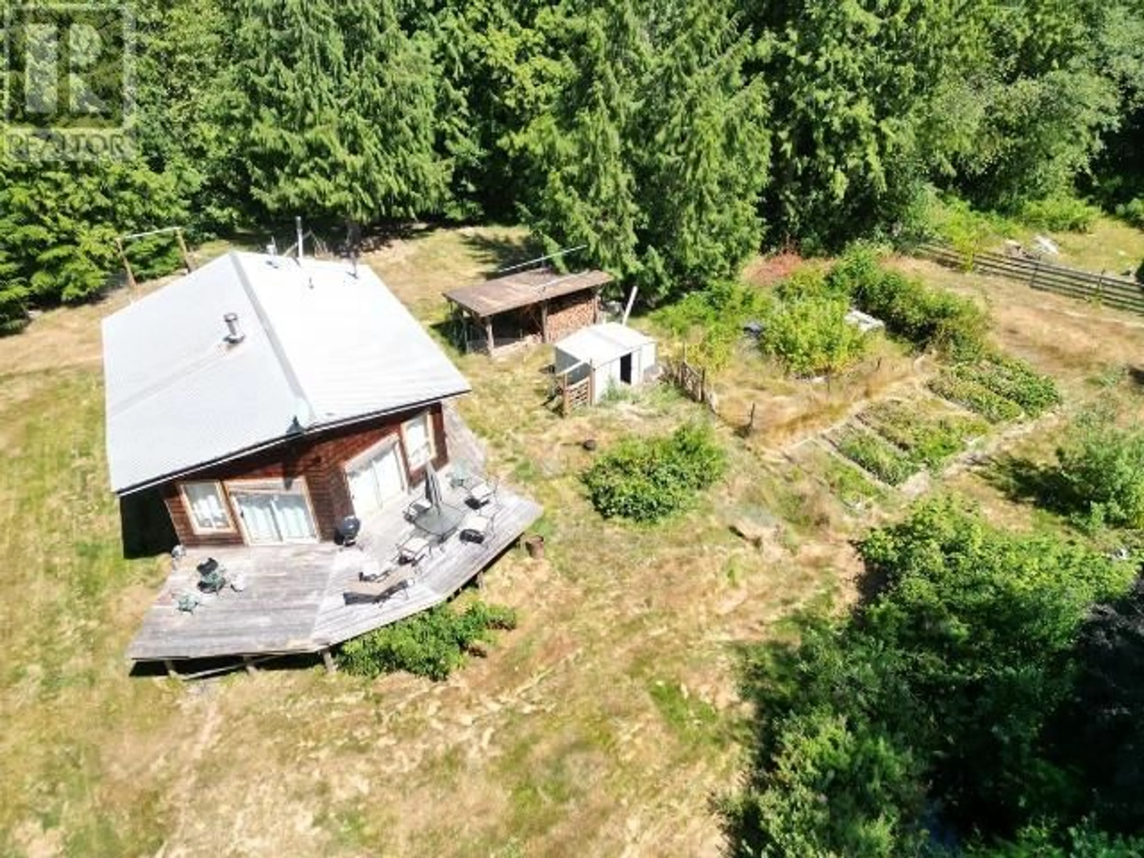 A pic from outside/outdoor area/front of a property/back of a property/a pic from drone, forest/trees view for 6000 DEIGHTON CREEK ROAD, Powell River British Columbia V8A0G8