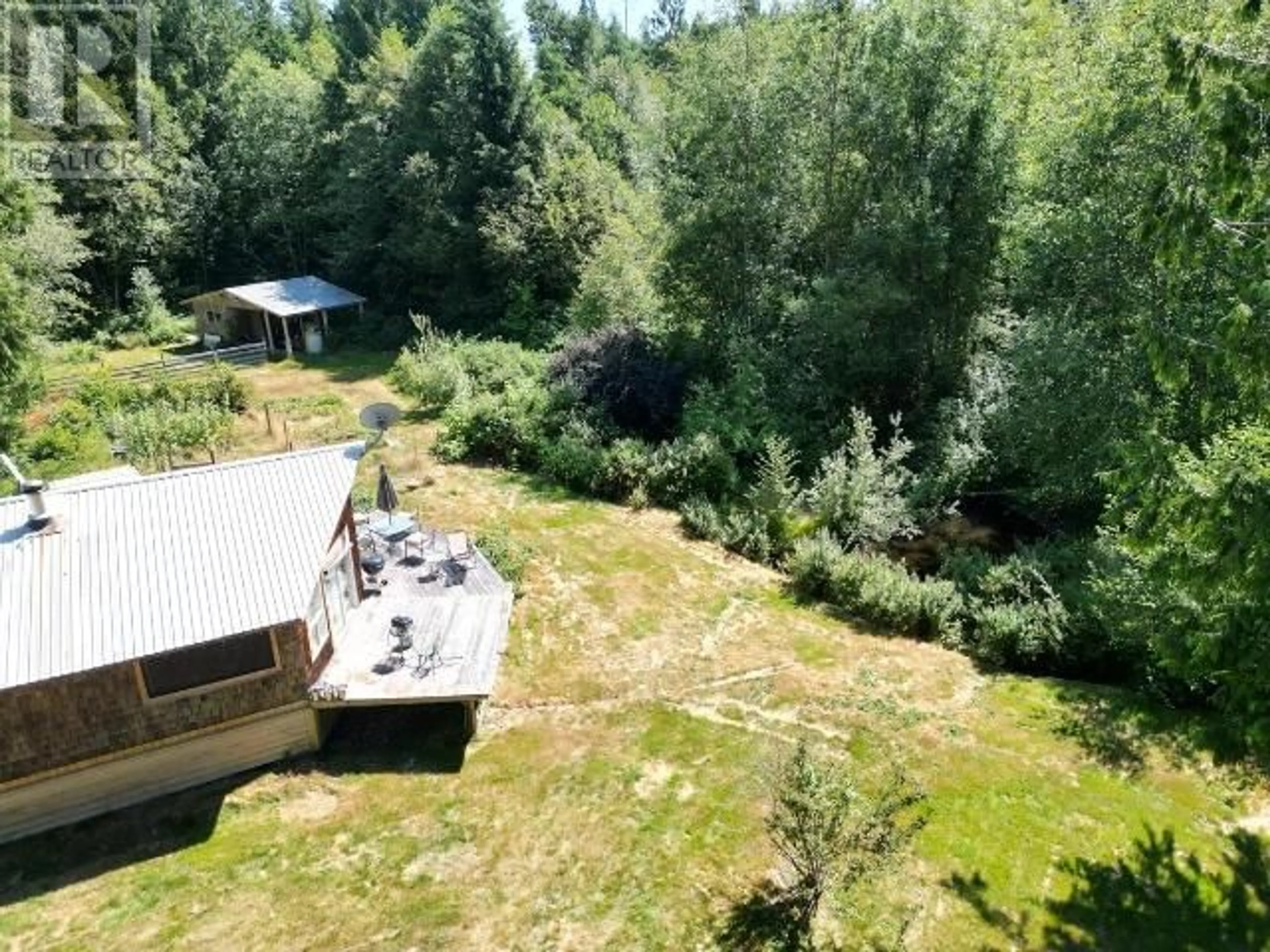 A pic from outside/outdoor area/front of a property/back of a property/a pic from drone, forest/trees view for 6000 DEIGHTON CREEK ROAD, Powell River British Columbia V8A0G8