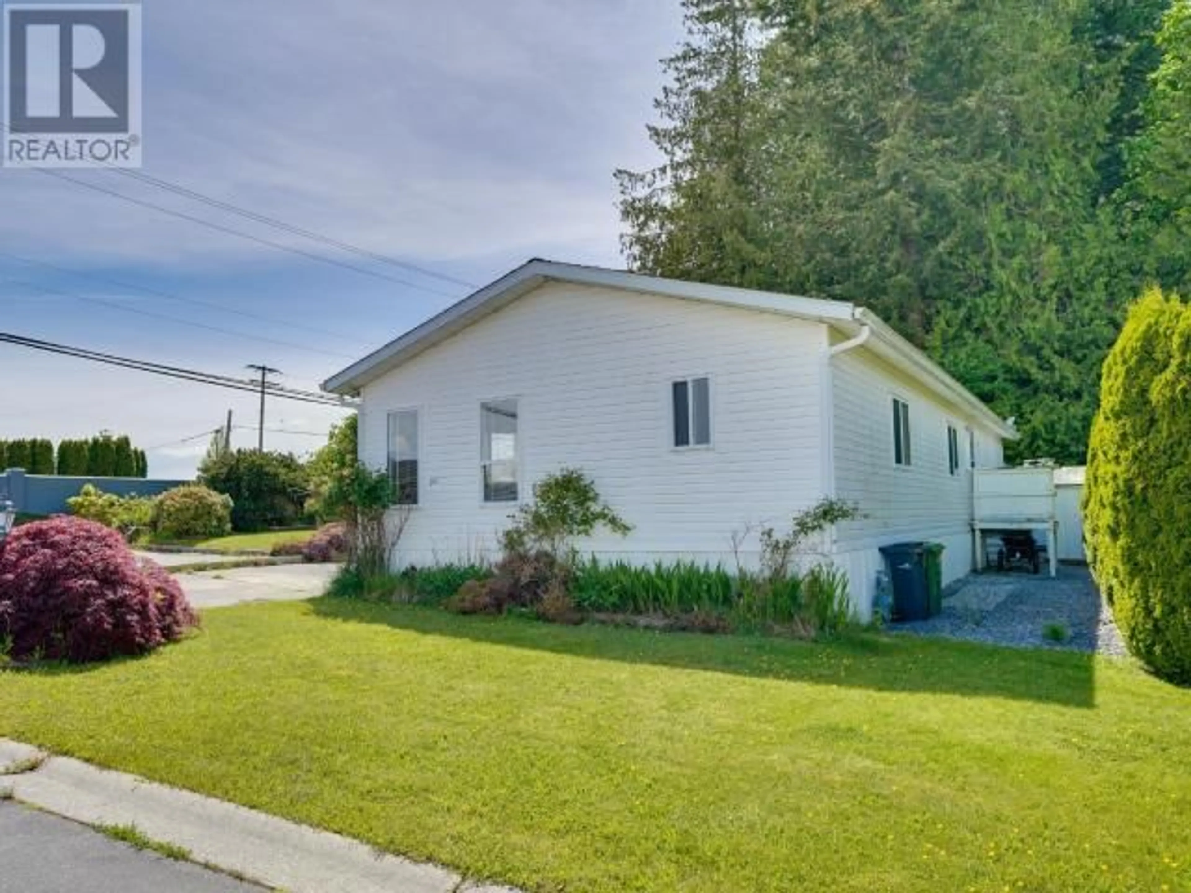 A pic from outside/outdoor area/front of a property/back of a property/a pic from drone, street for 201 - 7575 DUNCAN STREET, Powell River British Columbia V8A5L1