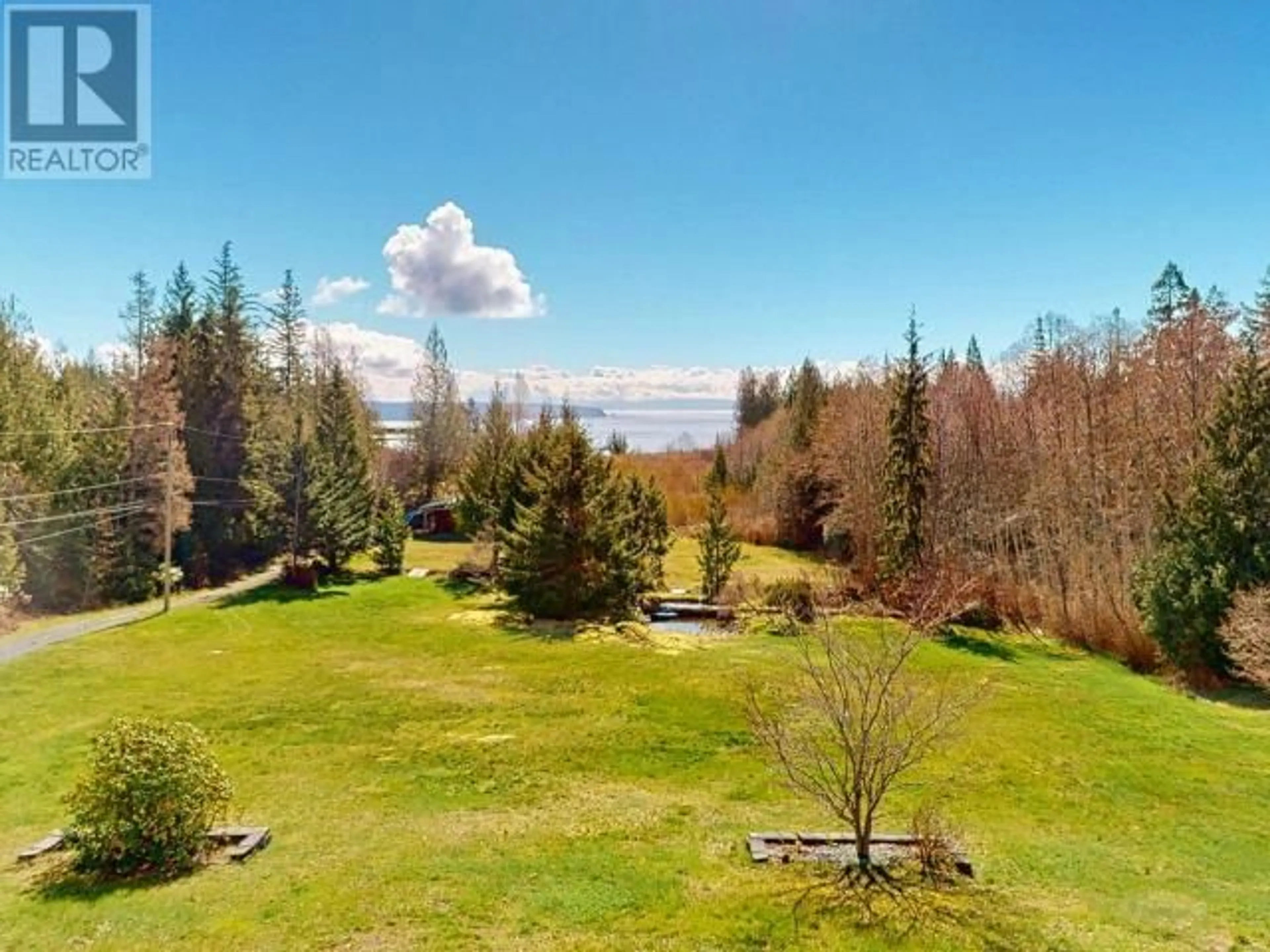 A pic from outside/outdoor area/front of a property/back of a property/a pic from drone, forest/trees view for 3749 HIGHWAY 101, Powell River British Columbia V8A0E2