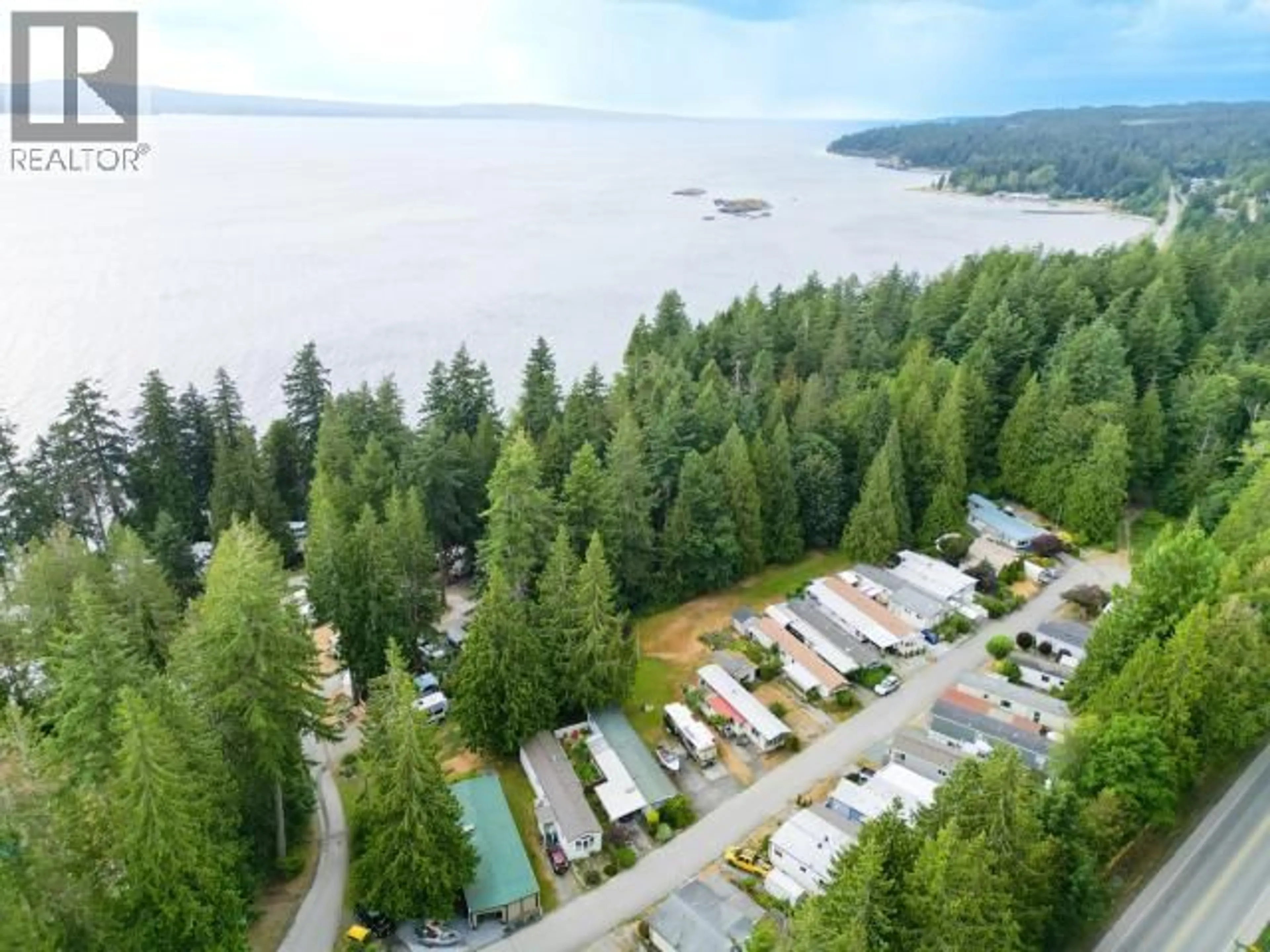 A pic from outside/outdoor area/front of a property/back of a property/a pic from drone, water/lake/river/ocean view for 16 - 8425 HIGHWAY 101, Powell River British Columbia V8A0G9