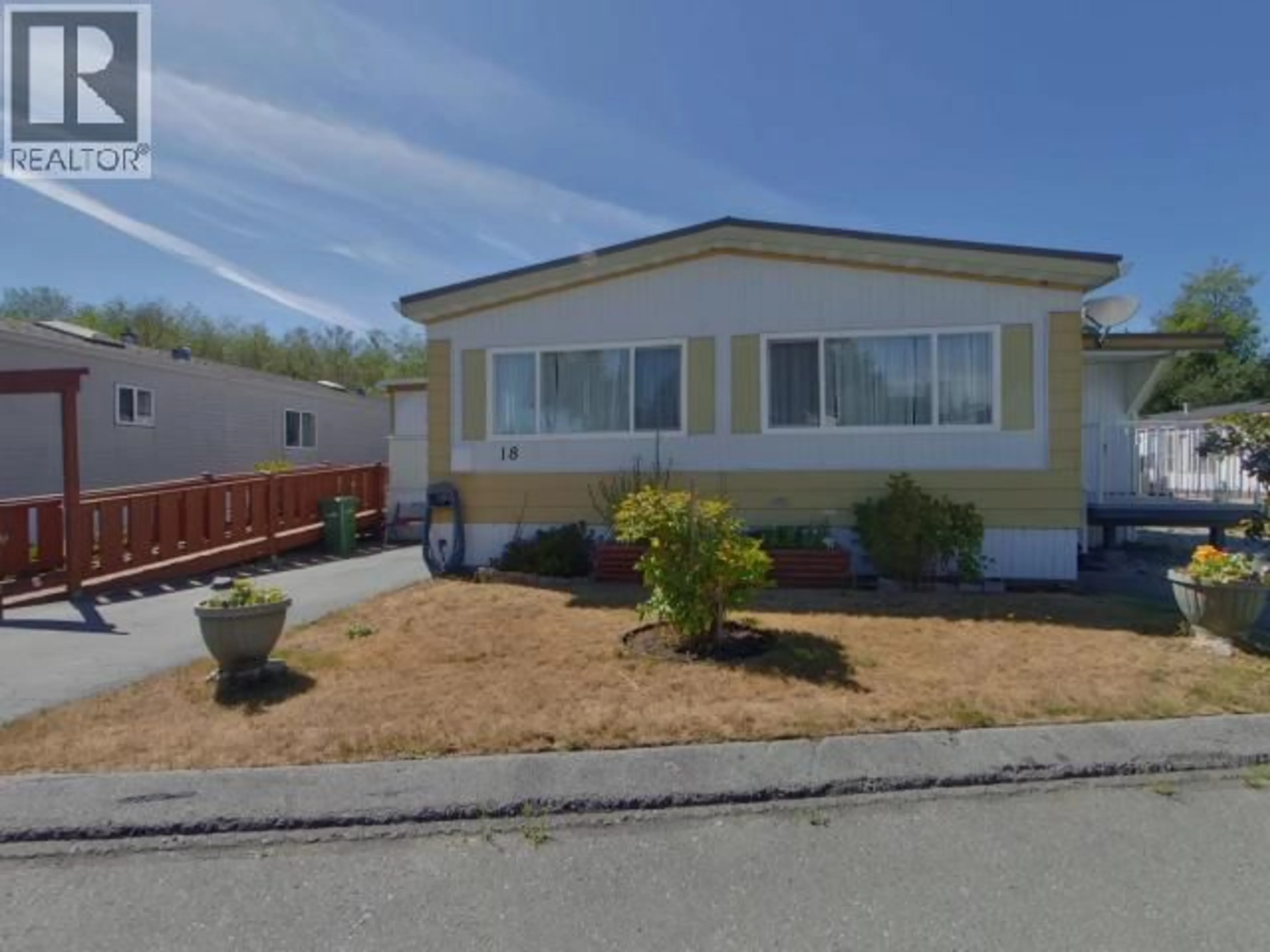 Home with vinyl exterior material, street for 18 - 7624 DUNCAN STREET, Powell River British Columbia V8A5L2