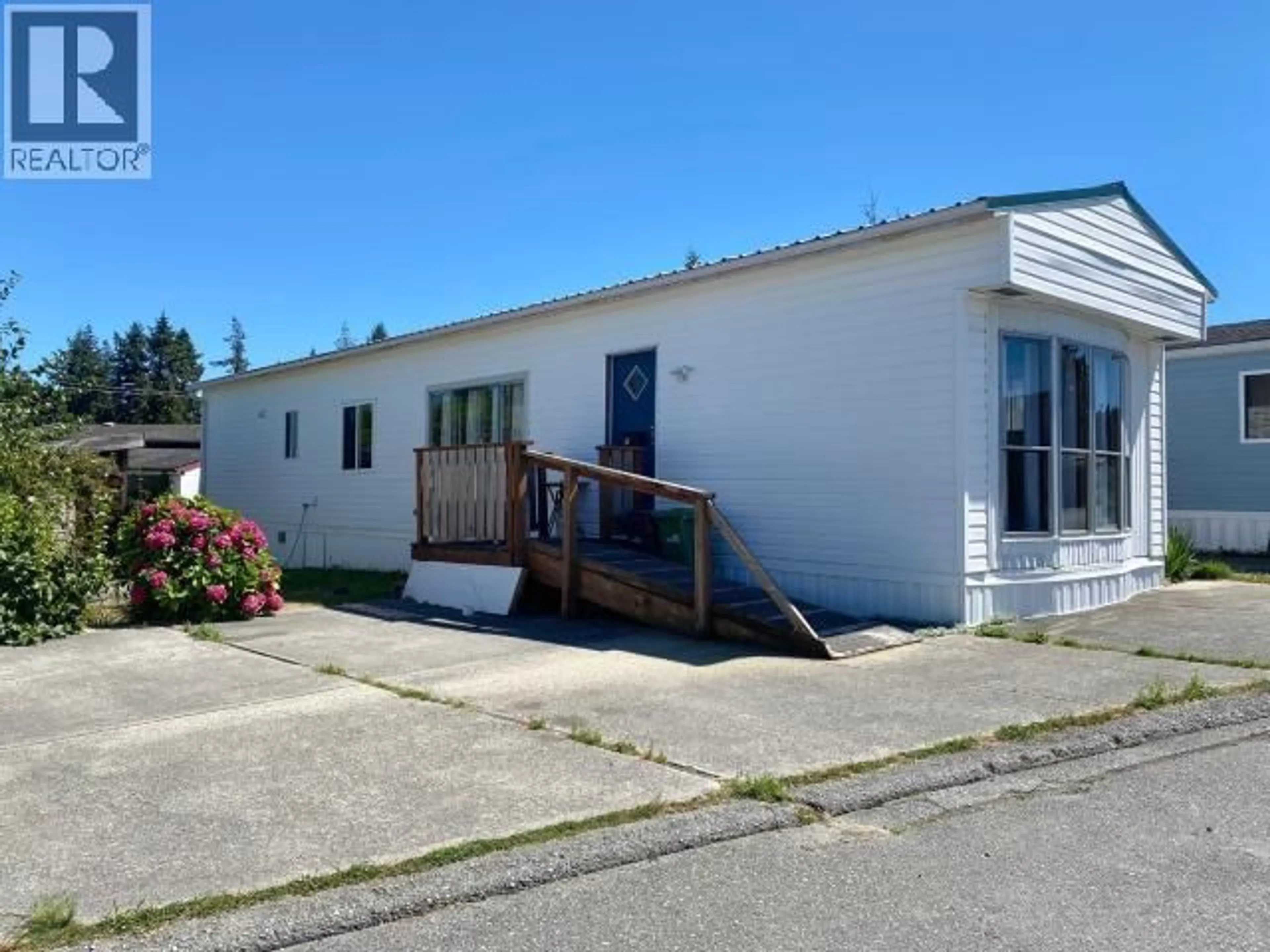 Home with vinyl exterior material, street for 56-7624 DUNCAN STREET, Powell River British Columbia V8A5L2