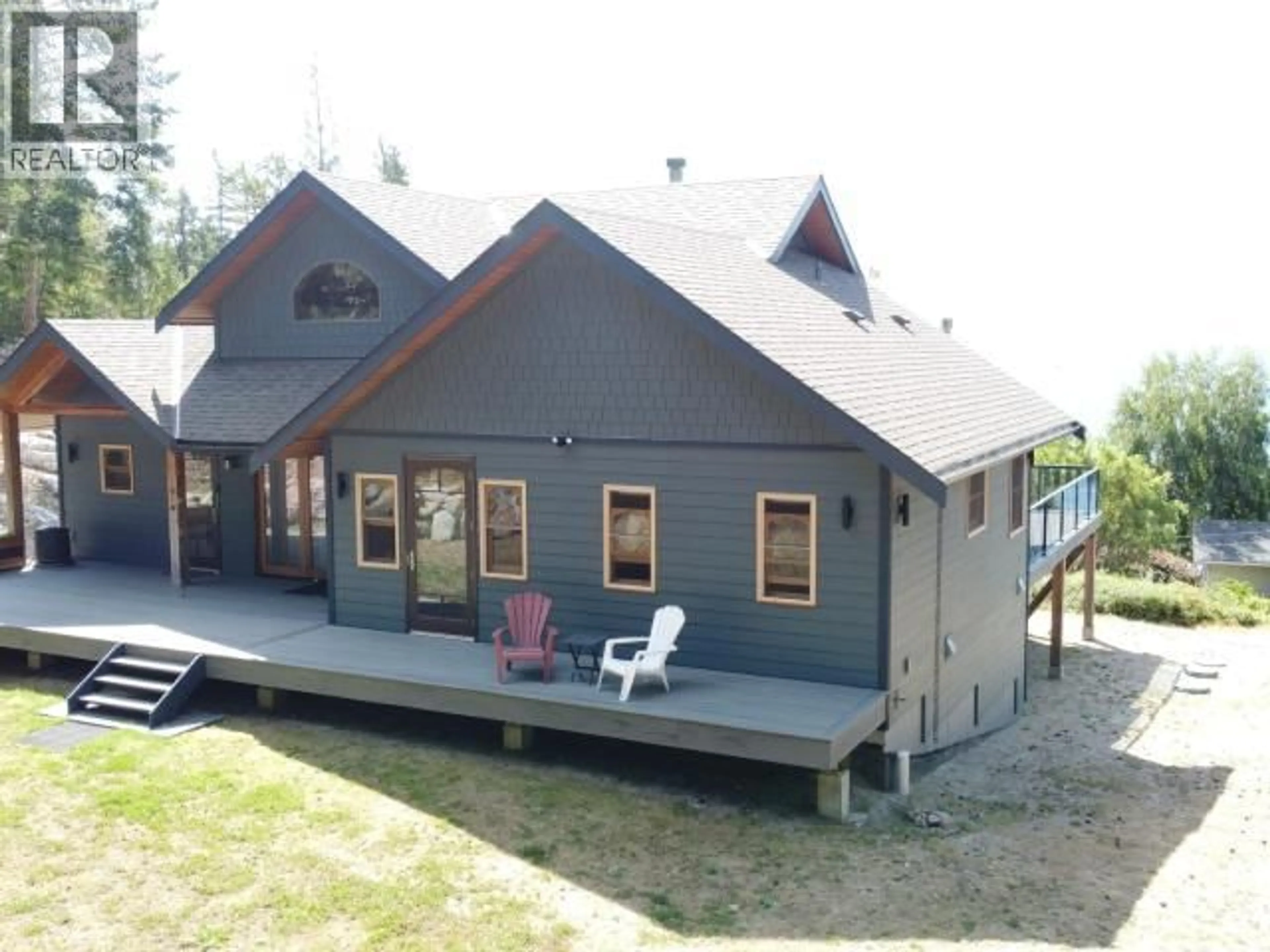 A pic from outside/outdoor area/front of a property/back of a property/a pic from drone, building for 8116 EMMONDS ROAD, Powell River British Columbia V8A0E7