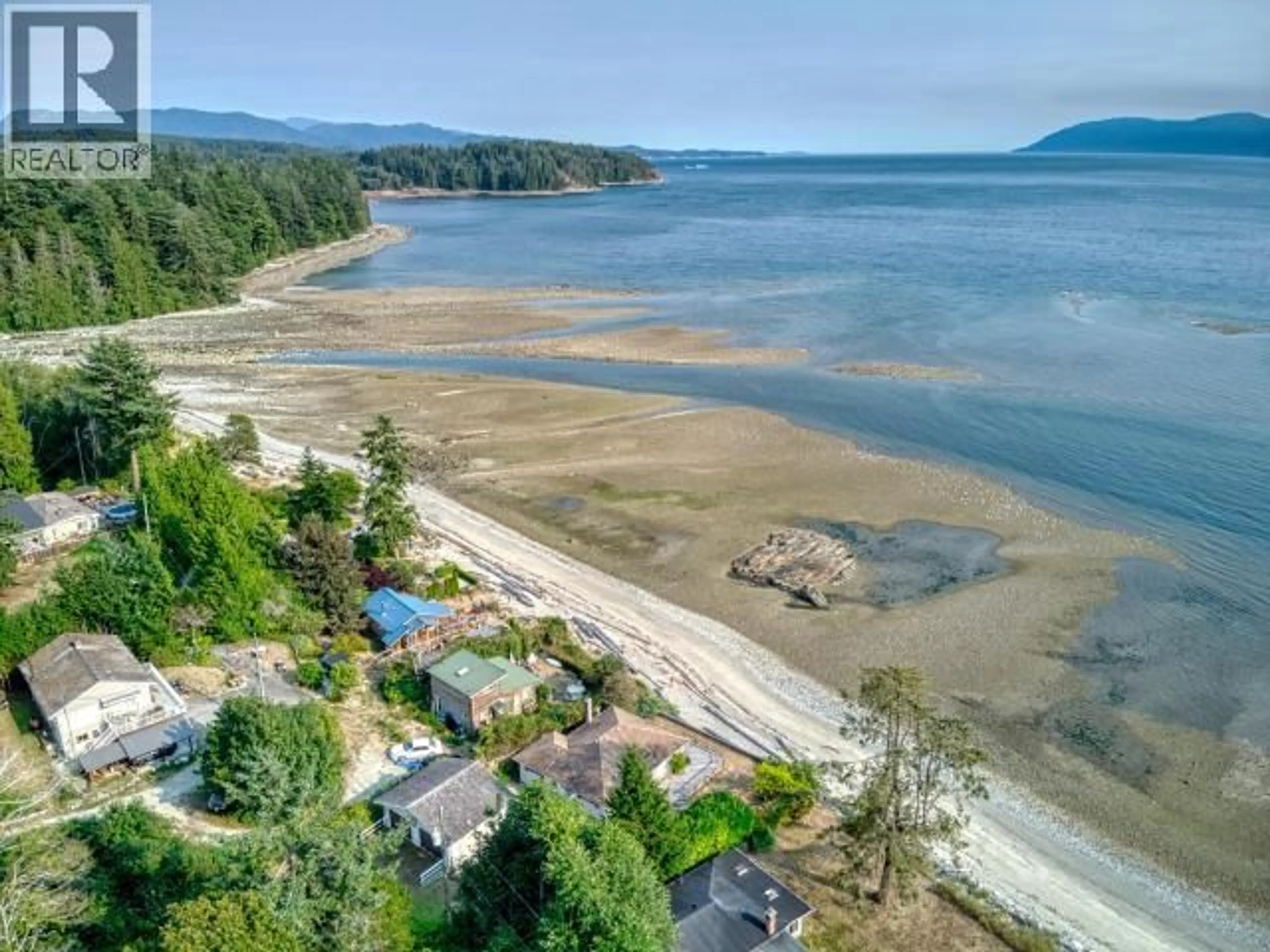 A pic from outside/outdoor area/front of a property/back of a property/a pic from drone, water/lake/river/ocean view for 11373 STUSTUS ROAD, Powell River British Columbia V8A0M2