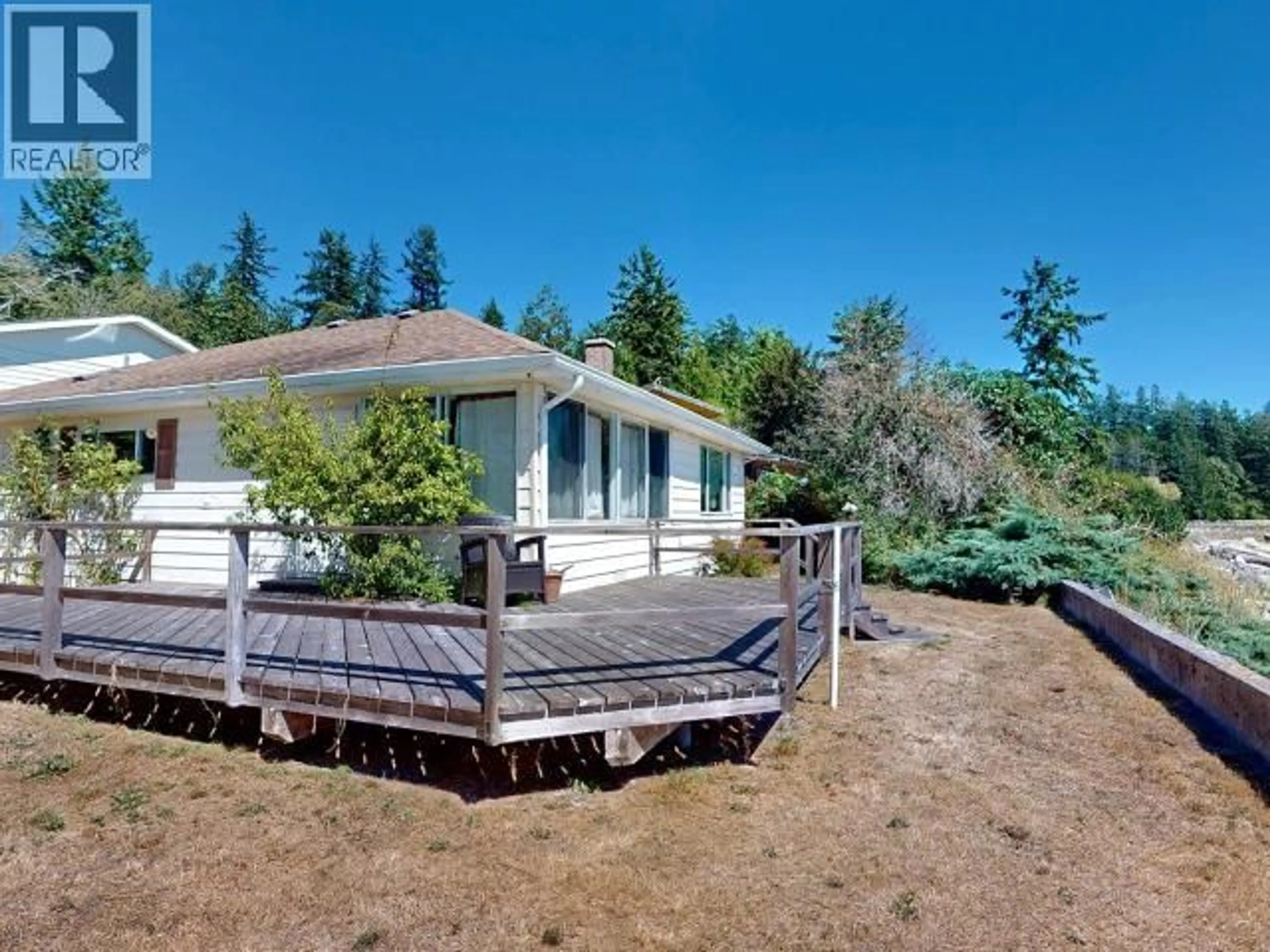 A pic from outside/outdoor area/front of a property/back of a property/a pic from drone, water/lake/river/ocean view for 11373 STUSTUS ROAD, Powell River British Columbia V8A0M2