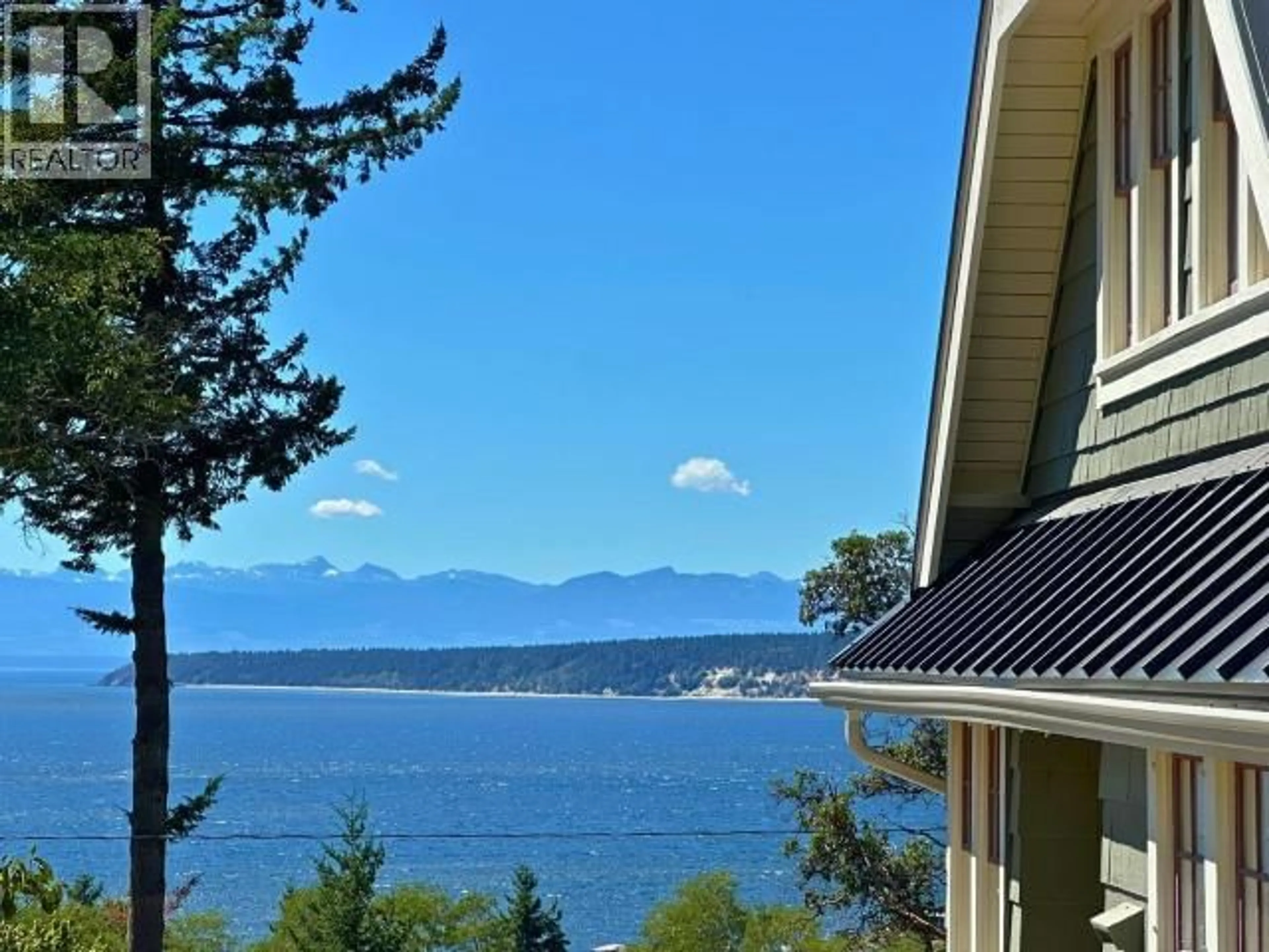 A pic from outside/outdoor area/front of a property/back of a property/a pic from drone, water/lake/river/ocean view for 5576 MARINE AVE, Powell River British Columbia V8A2M2