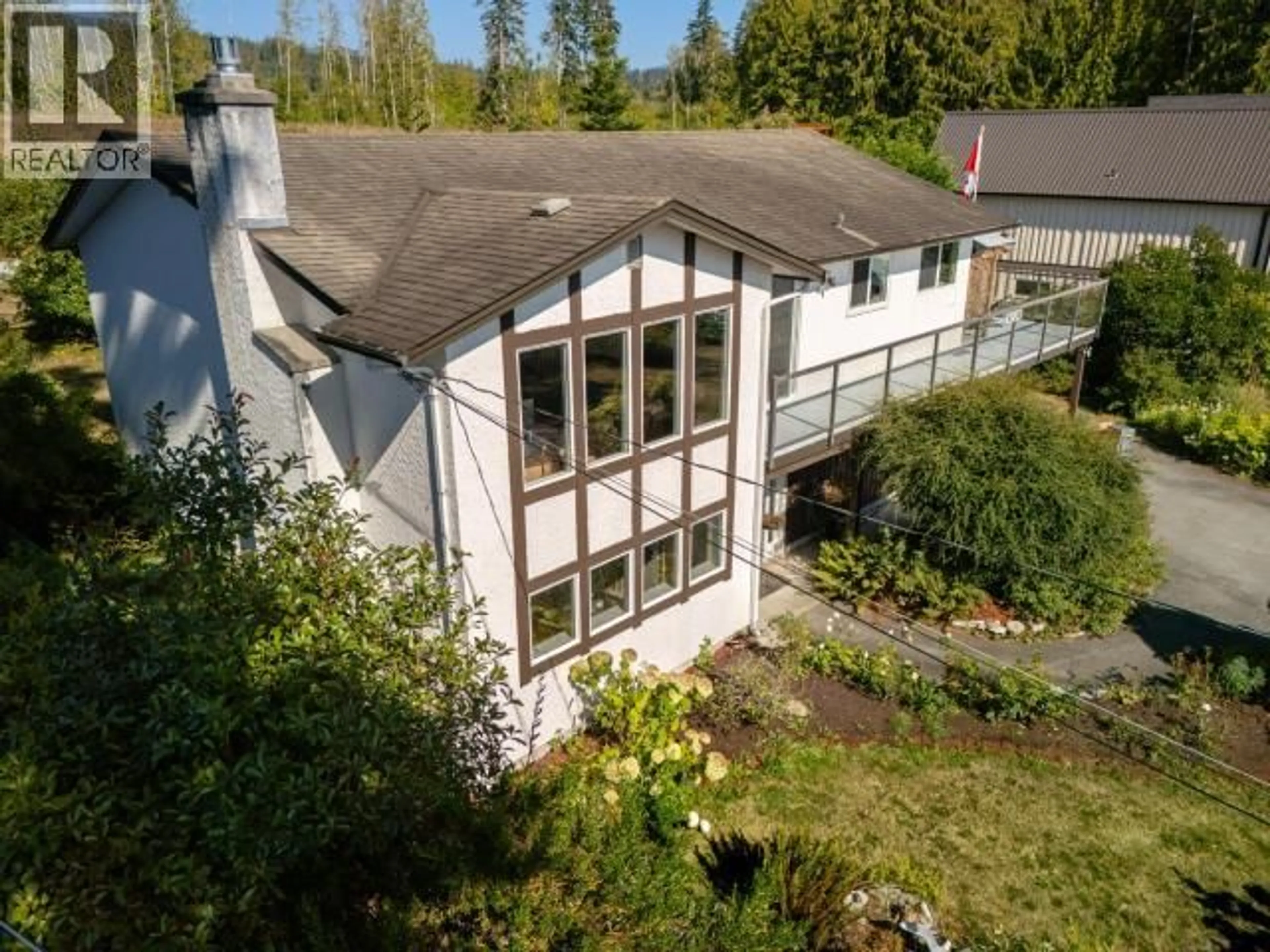 A pic from outside/outdoor area/front of a property/back of a property/a pic from drone, unknown for 8230 CENTENNIAL DRIVE, Powell River British Columbia