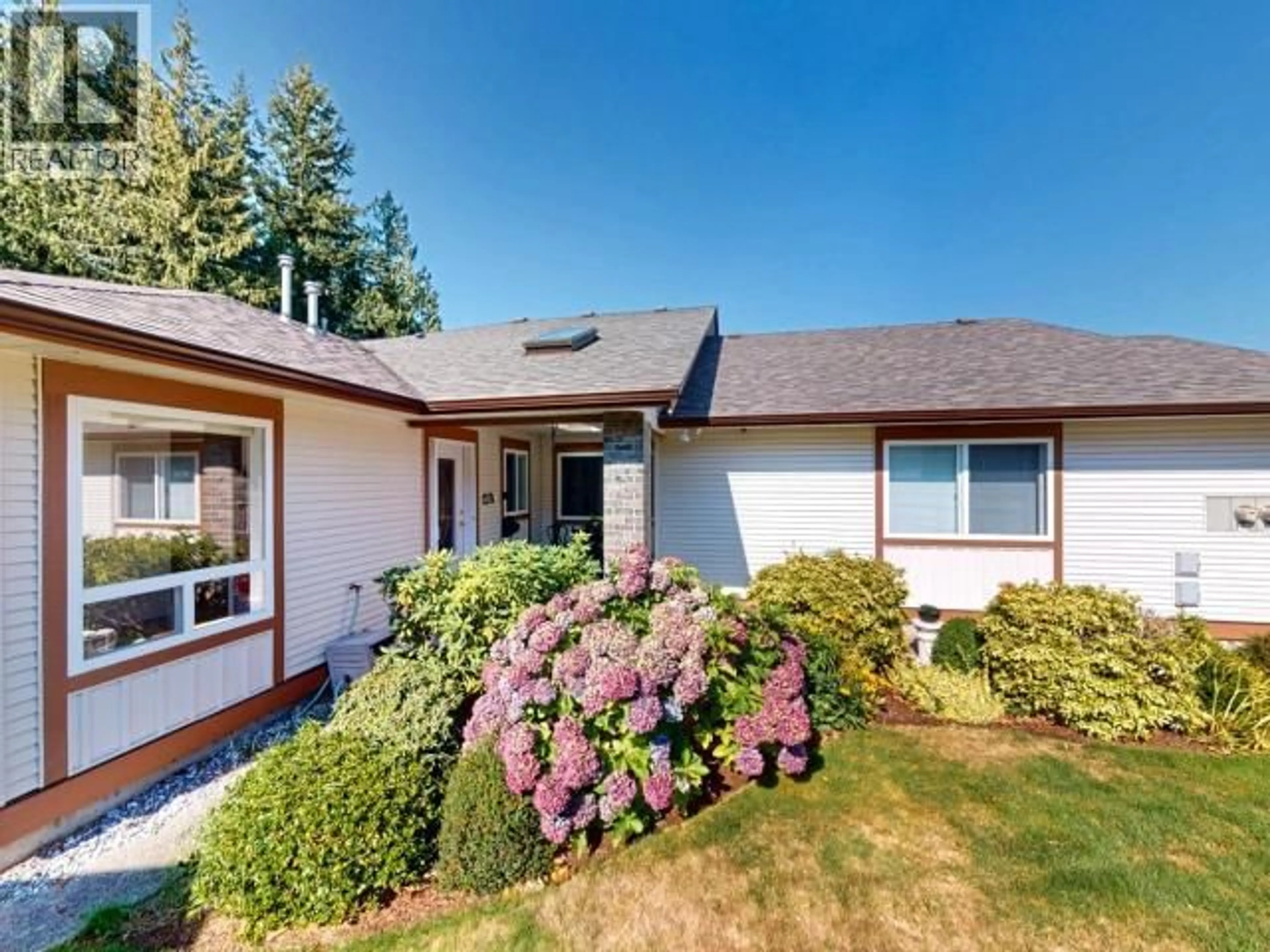 Home with vinyl exterior material, street for 5 - 4897 ONTARIO AVE, Powell River British Columbia V8A5T7