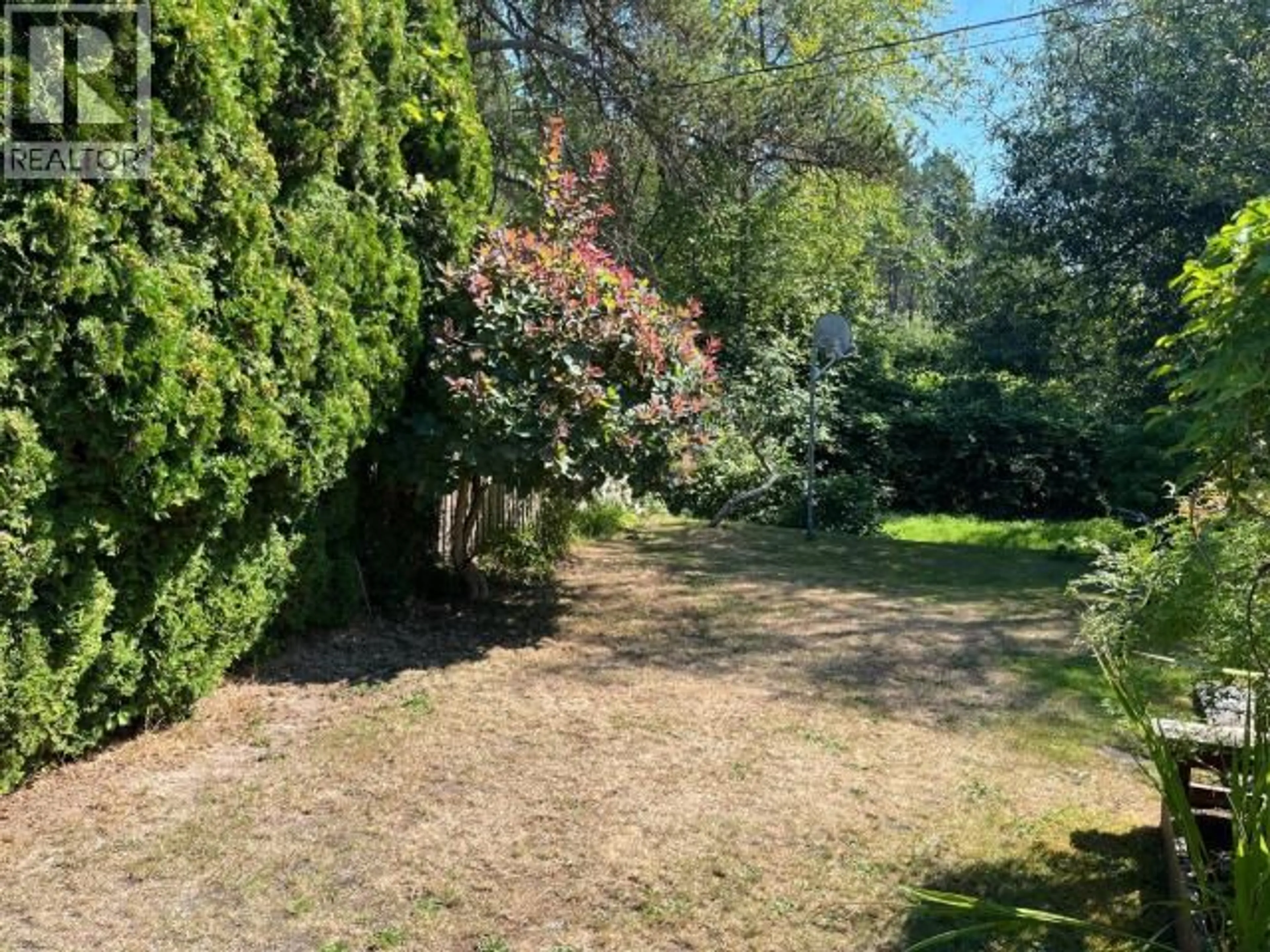 A pic from outside/outdoor area/front of a property/back of a property/a pic from drone, forest/trees view for 52 - 5455 BORDEN PLACE, Powell River British Columbia V8A3W1