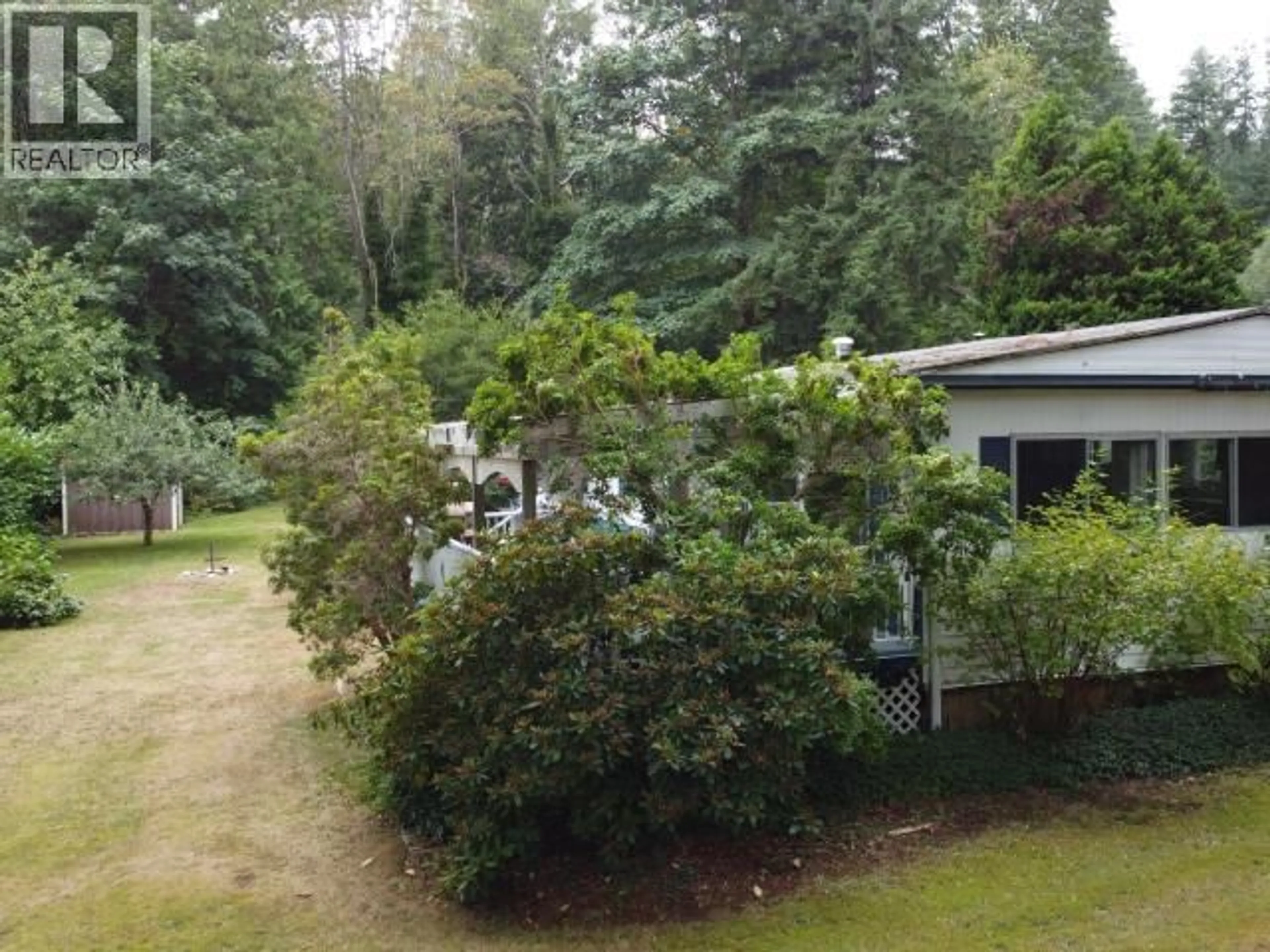 A pic from outside/outdoor area/front of a property/back of a property/a pic from drone, forest/trees view for 2207 DONKERSLEY ROAD, Powell River British Columbia V8A0K6
