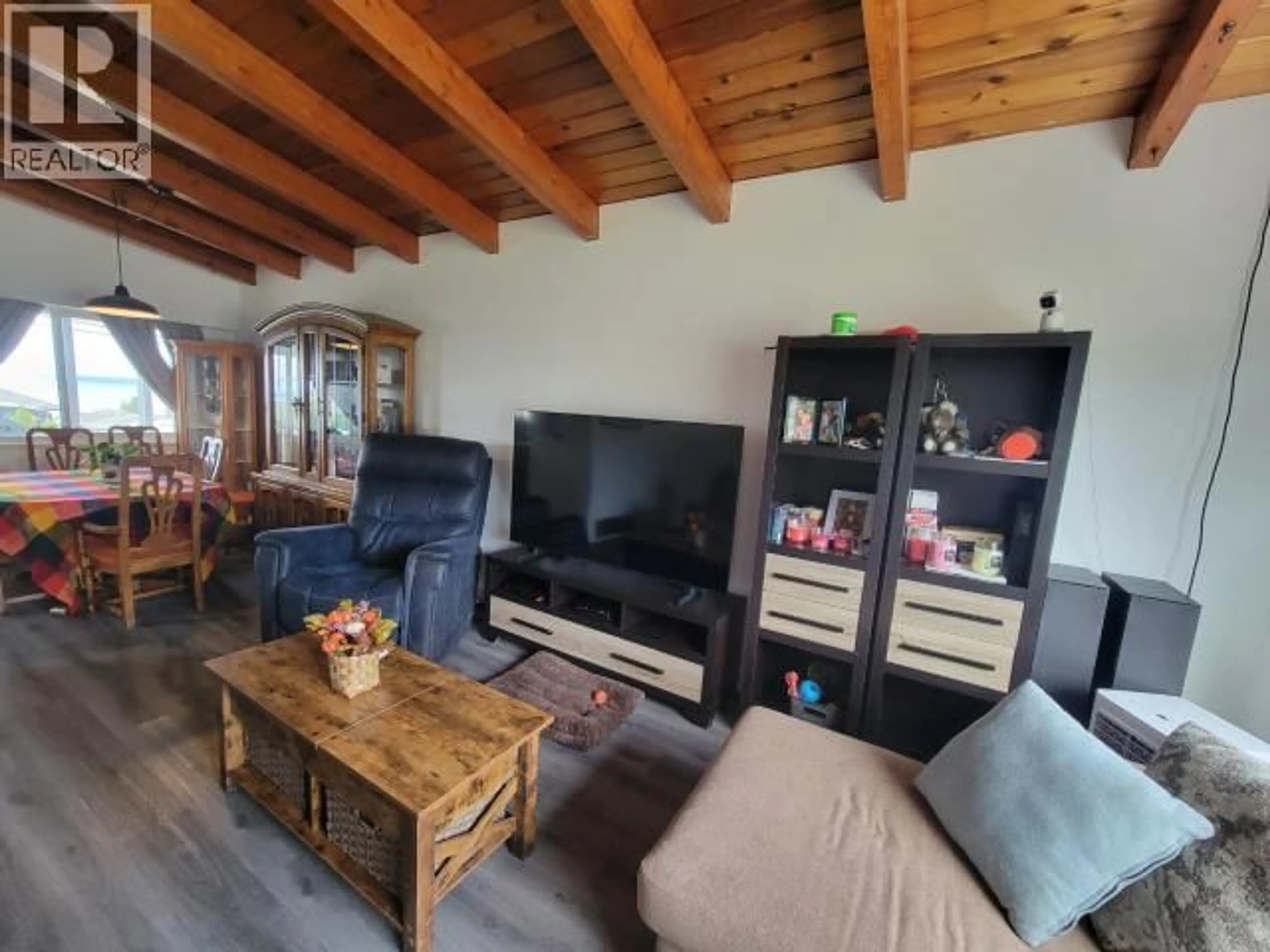 Living room with furniture, wood/laminate floor for 4029 JOYCE AVE, Powell River British Columbia V8A2Z4