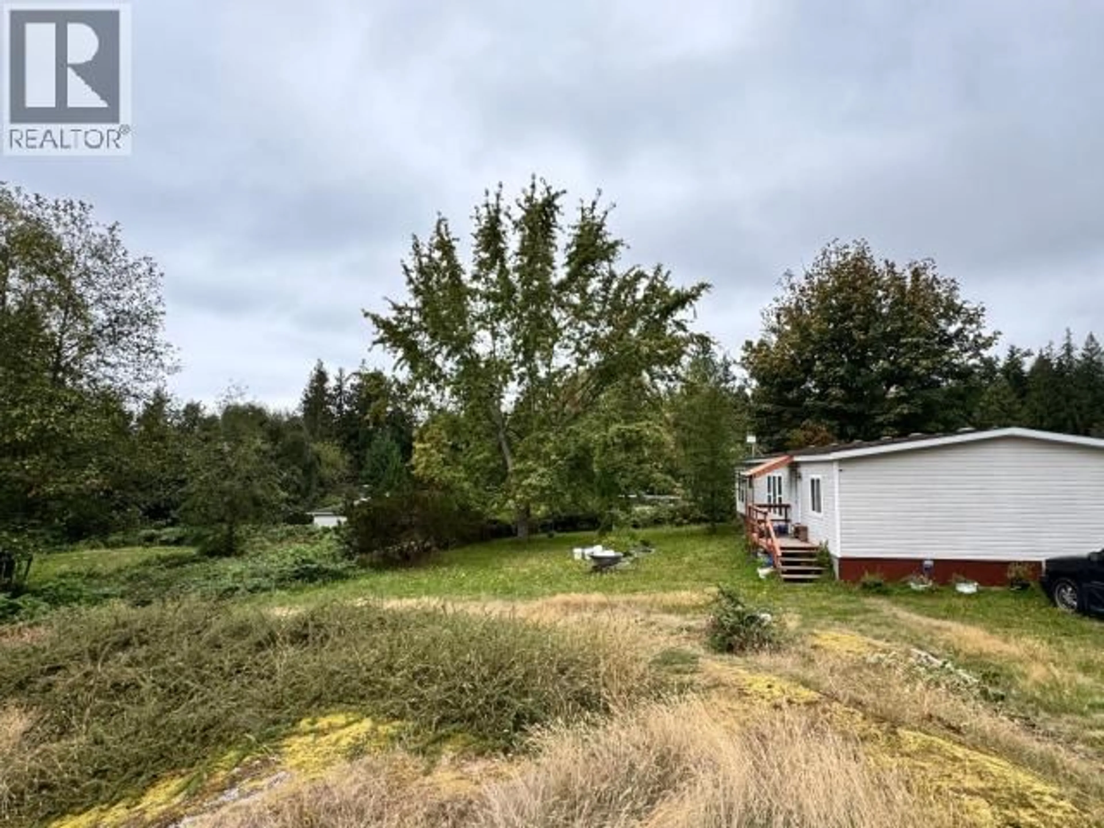 A pic from outside/outdoor area/front of a property/back of a property/a pic from drone, forest/trees view for 15029 HIGHWAY 101, Powell River British Columbia V8A0N2