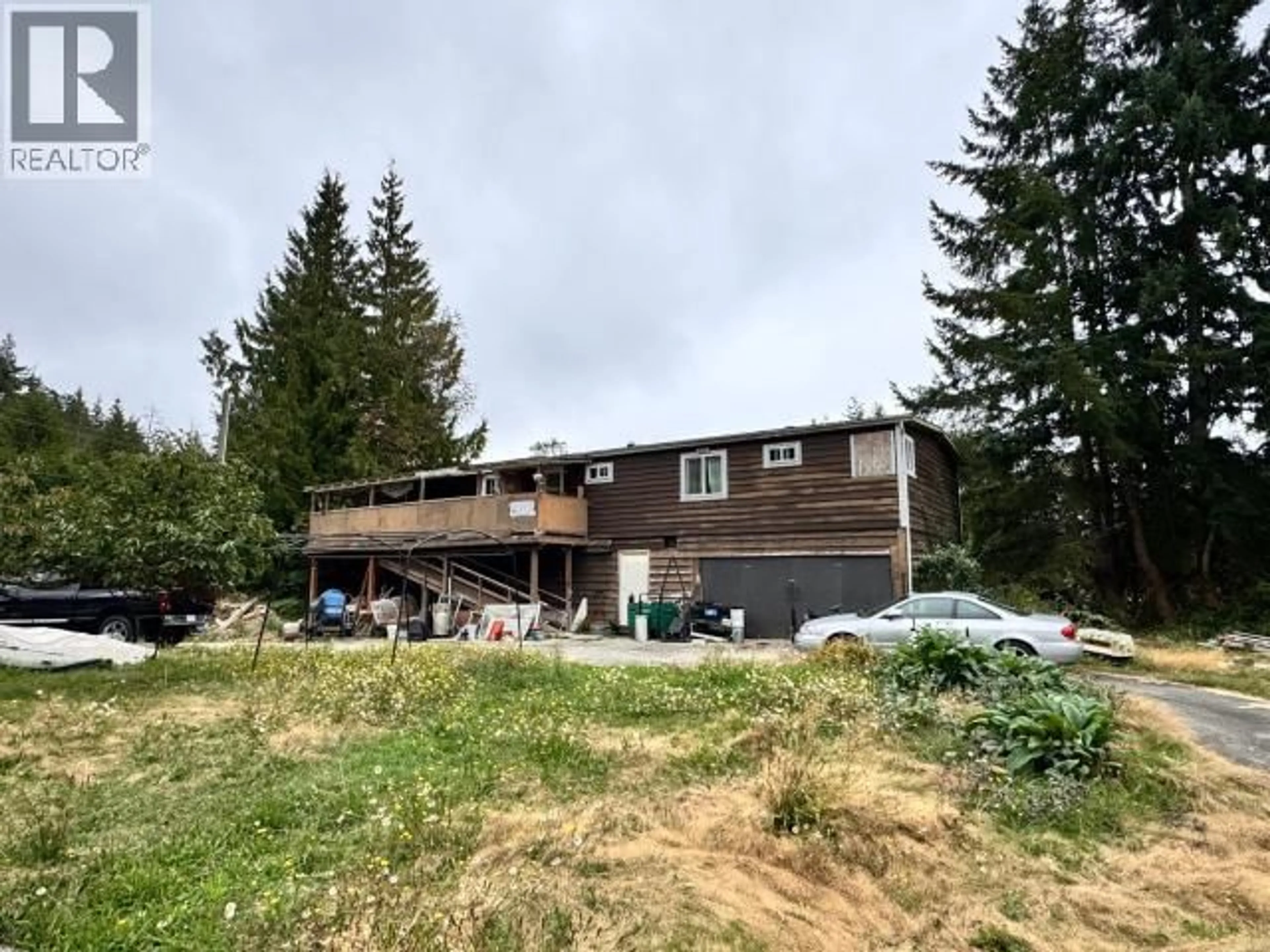 A pic from outside/outdoor area/front of a property/back of a property/a pic from drone, mountain view for 15029 HIGHWAY 101, Powell River British Columbia V8A0N2