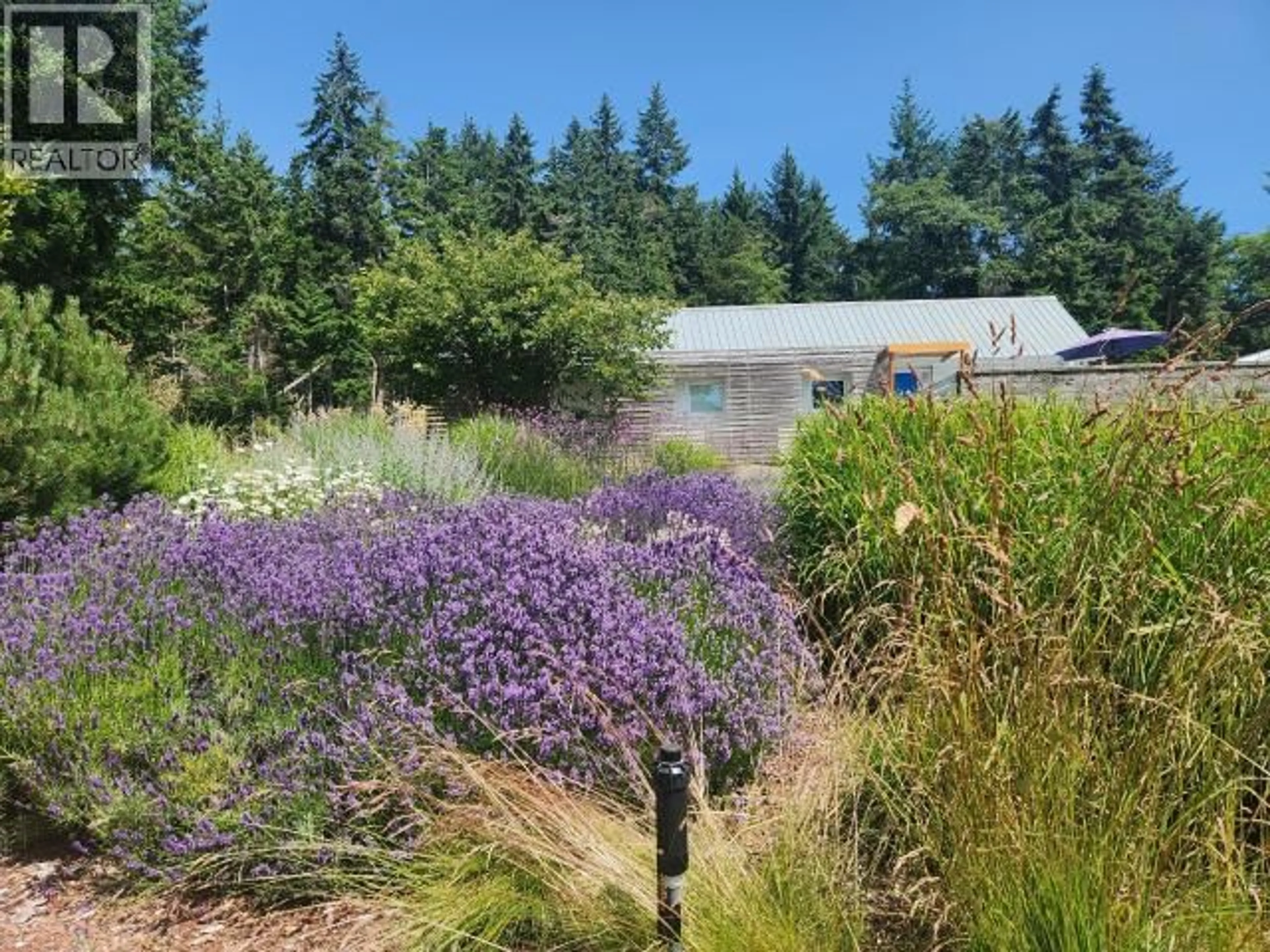 A pic from outside/outdoor area/front of a property/back of a property/a pic from drone, unknown for 5667 GILLIES BAY RD ROAD, Texada Island British Columbia V0N1W0