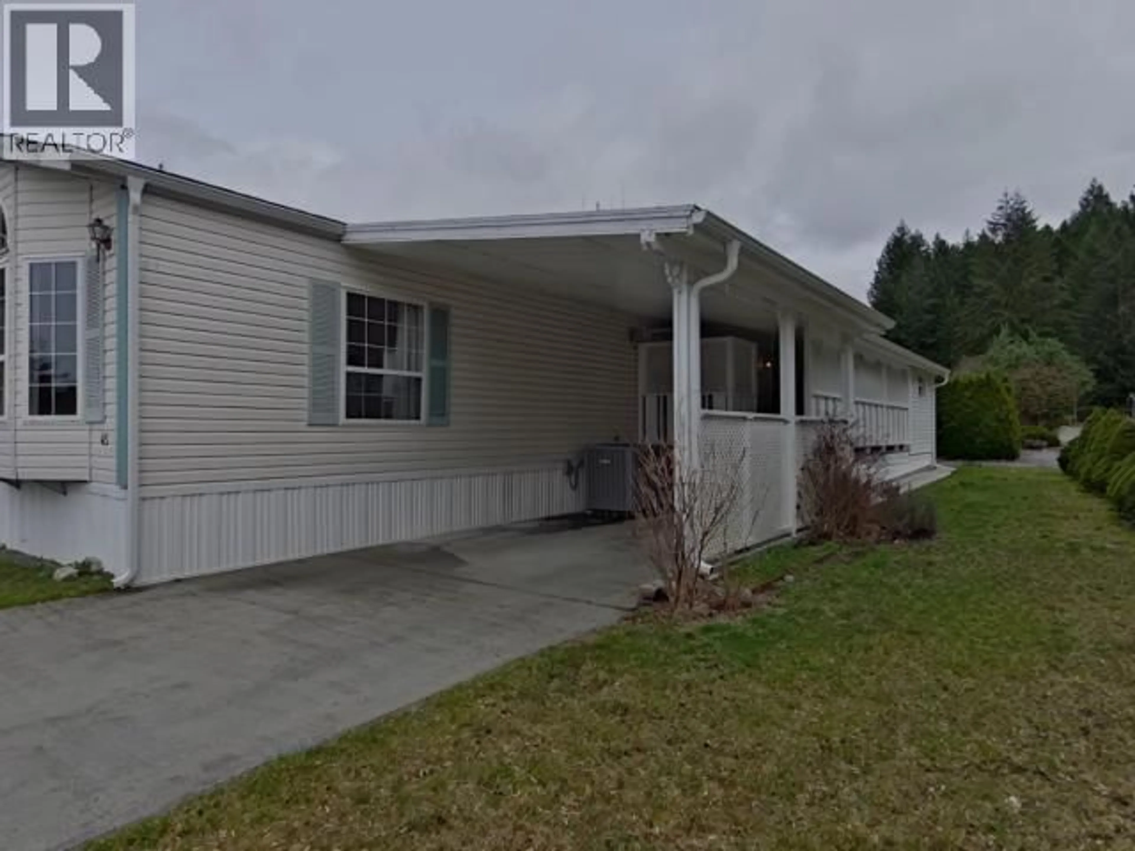 Home with vinyl exterior material, street for 45-6271 MCANDREW AVE, Powell River British Columbia V8A5G8