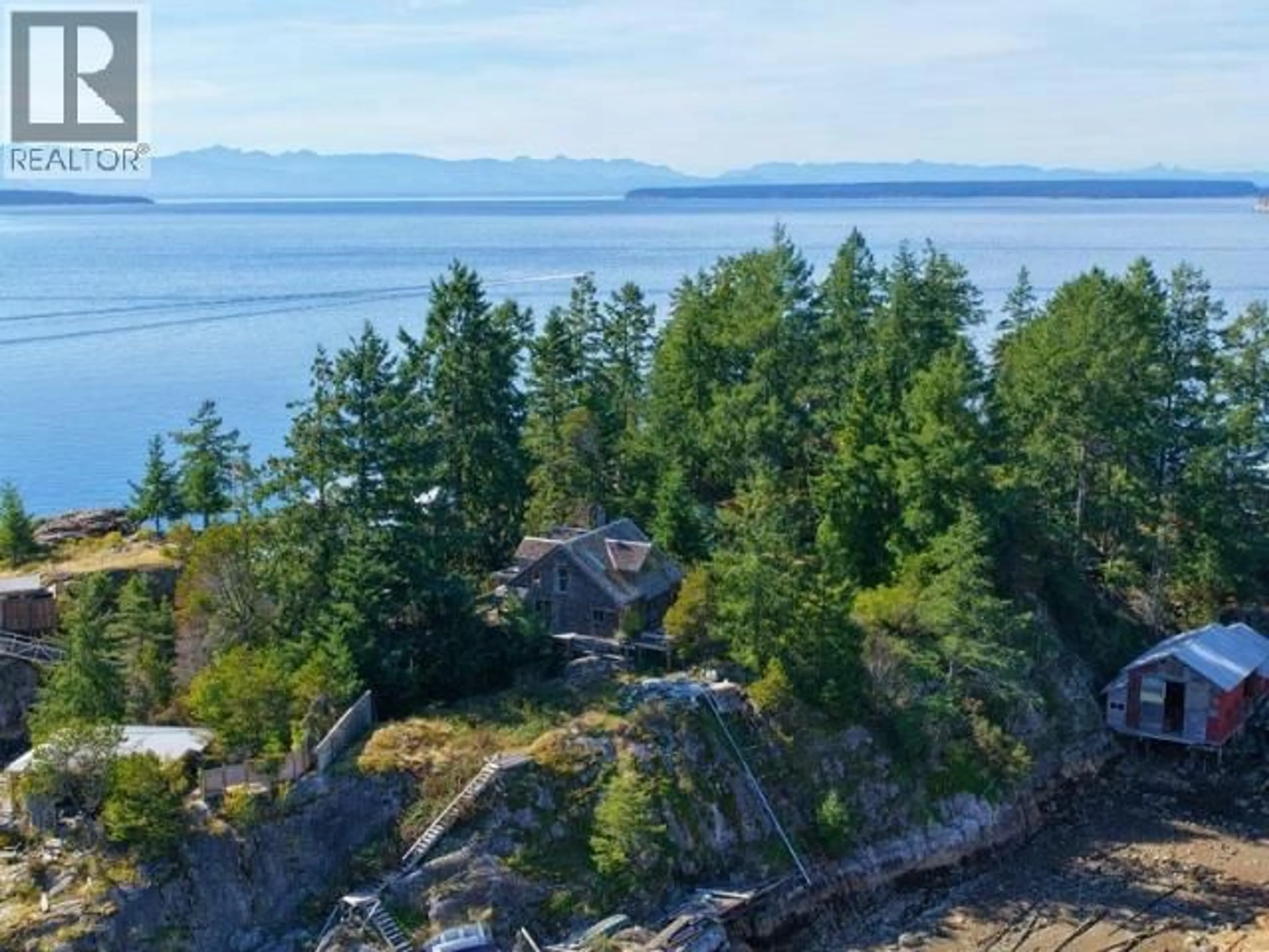 A pic from outside/outdoor area/front of a property/back of a property/a pic from drone, water/lake/river/ocean view for 9836 SEVILLA ISLAND, Powell River British Columbia V0N2G0