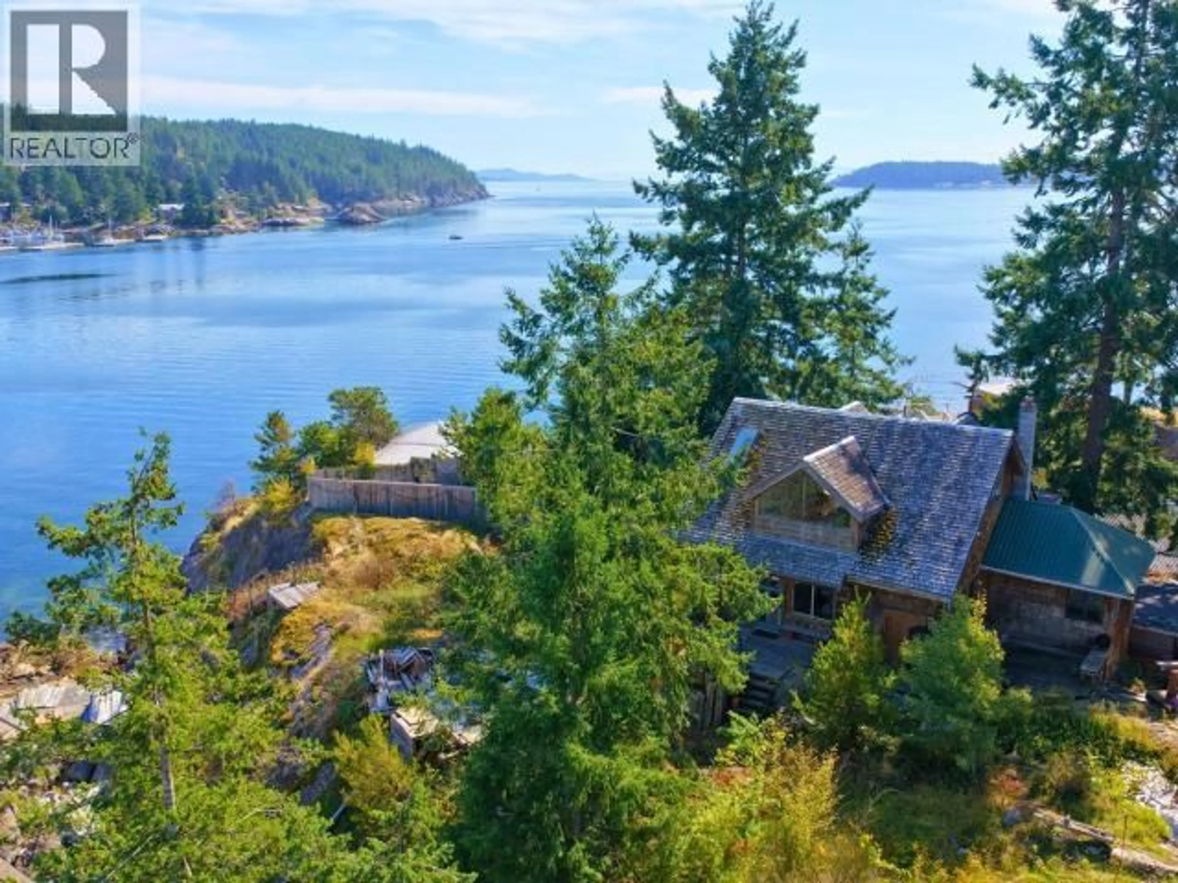 A pic from outside/outdoor area/front of a property/back of a property/a pic from drone, water/lake/river/ocean view for 9836 SEVILLA ISLAND, Powell River British Columbia V0N2G0
