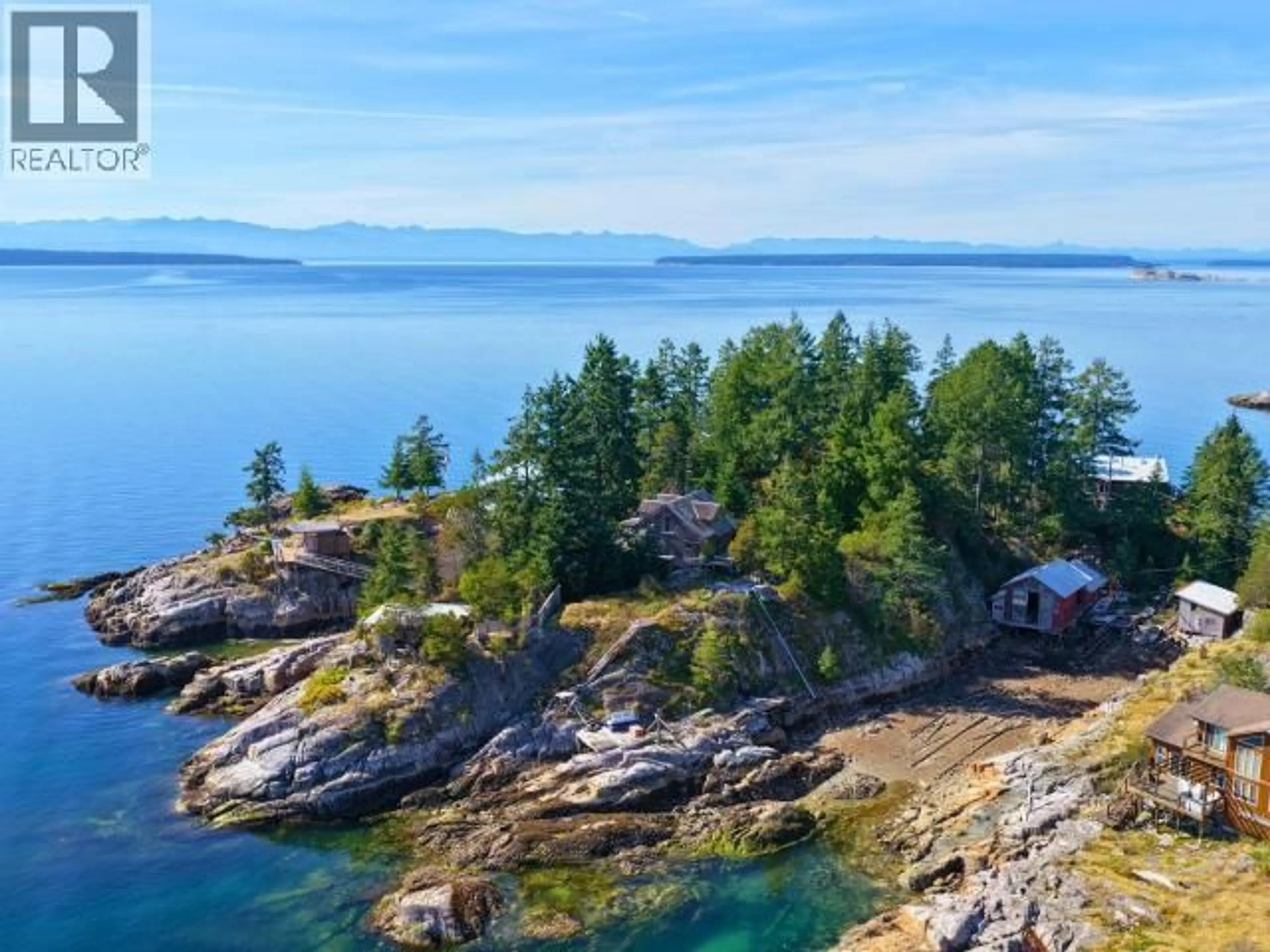 A pic from outside/outdoor area/front of a property/back of a property/a pic from drone, water/lake/river/ocean view for 9836 SEVILLA ISLAND, Powell River British Columbia V0N2G0