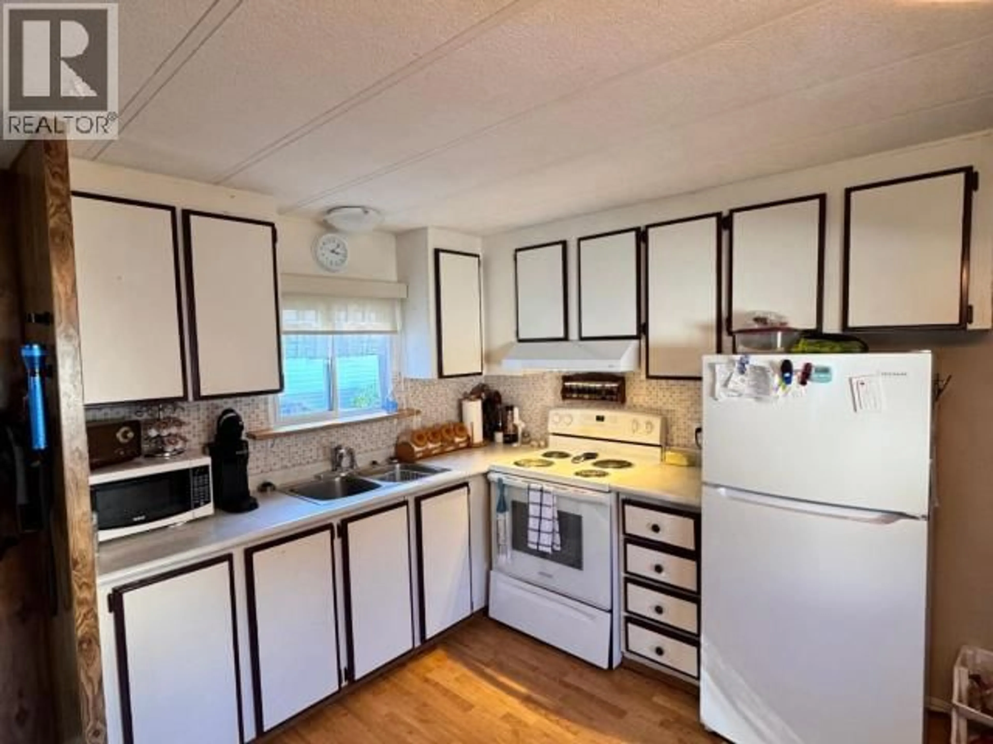 Standard kitchen, wood/laminate floor for 62-4500 CLARIDGE ROAD, Powell River British Columbia