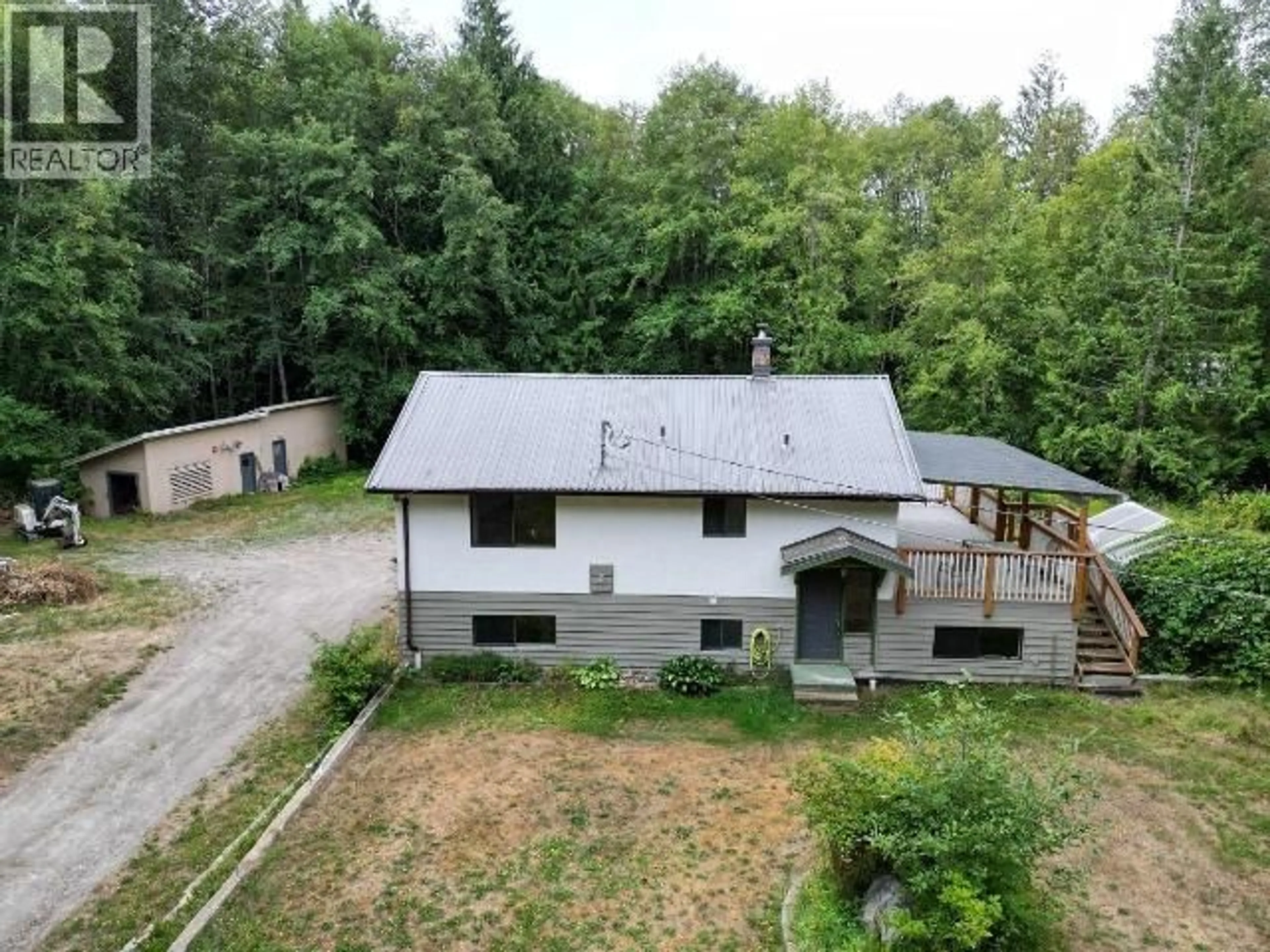 A pic from outside/outdoor area/front of a property/back of a property/a pic from drone, building for 4849 TOMKINSON ROAD, Powell River British Columbia V8A0C5