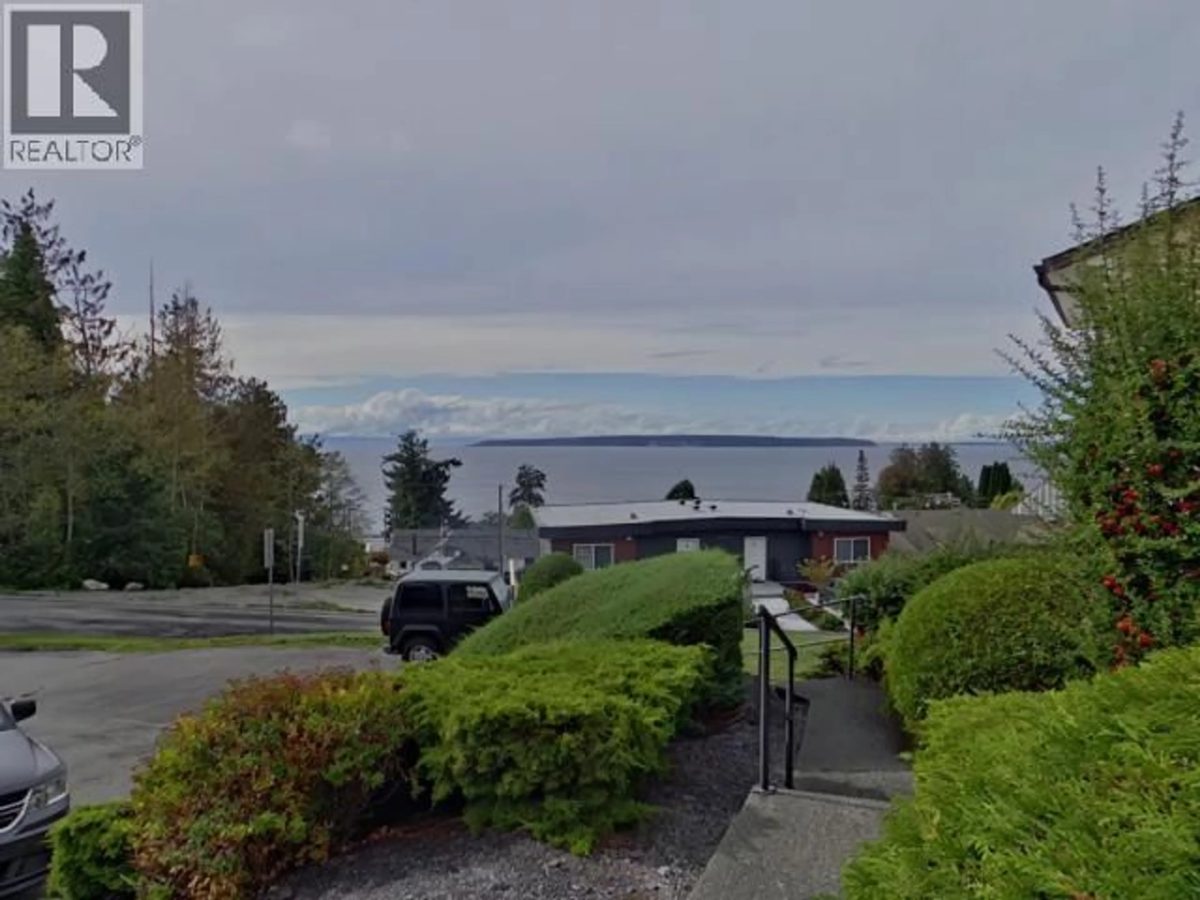 A pic from outside/outdoor area/front of a property/back of a property/a pic from drone, mountain view for 14-4651 HARVIE AVE, Powell River British Columbia V8A2P4