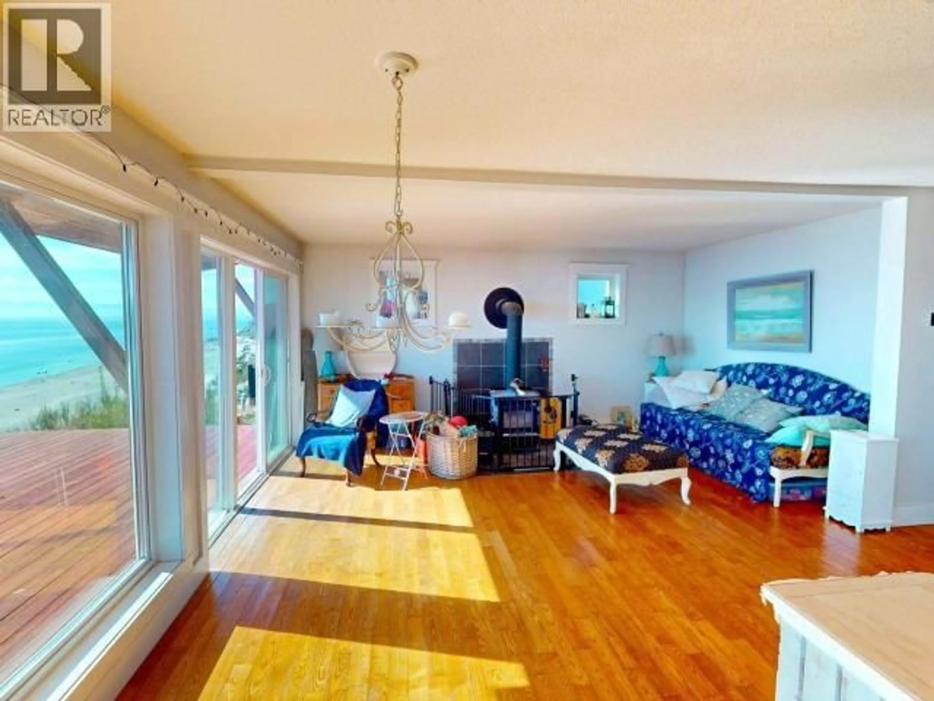 Living room with furniture, unknown for 3176 OCEANVIEW LANE, Savary Island British Columbia