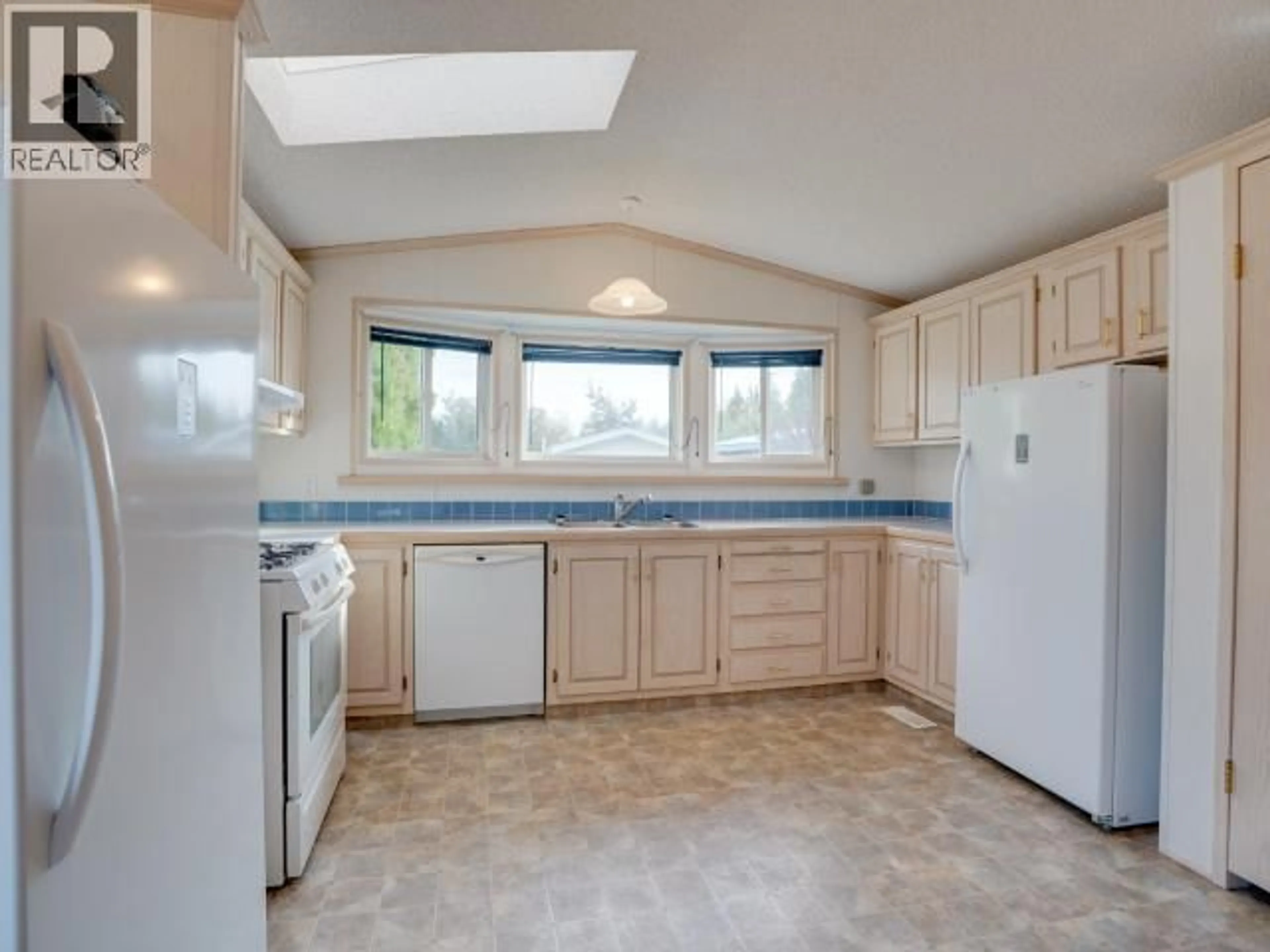 Standard kitchen, ceramic/tile floor for 2 - 7520 NOOTKA STREET, Powell River British Columbia V8A5S2