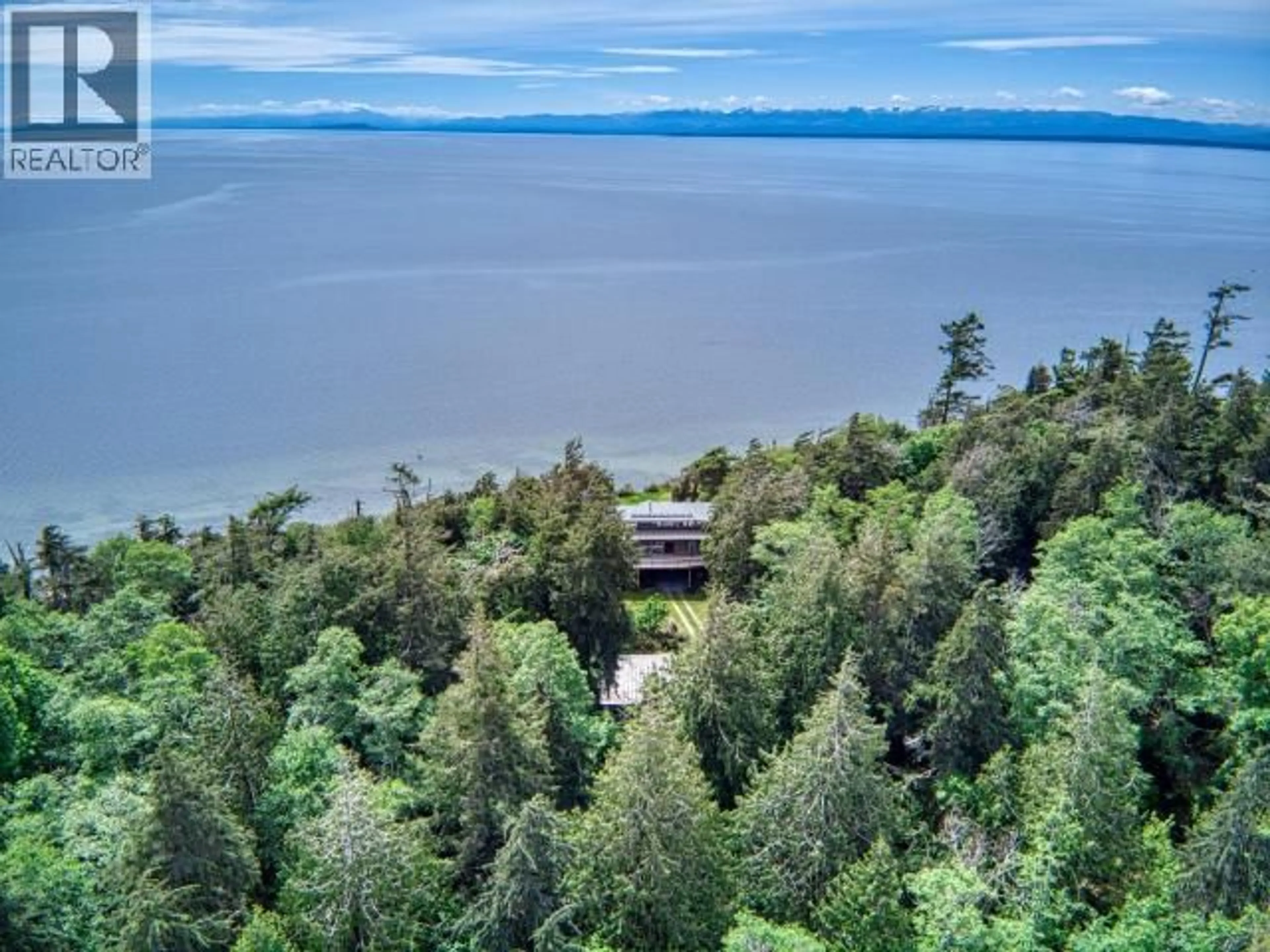A pic from outside/outdoor area/front of a property/back of a property/a pic from drone, water/lake/river/ocean view for 1628 VANCOUVER BLVD, Savary Island British Columbia