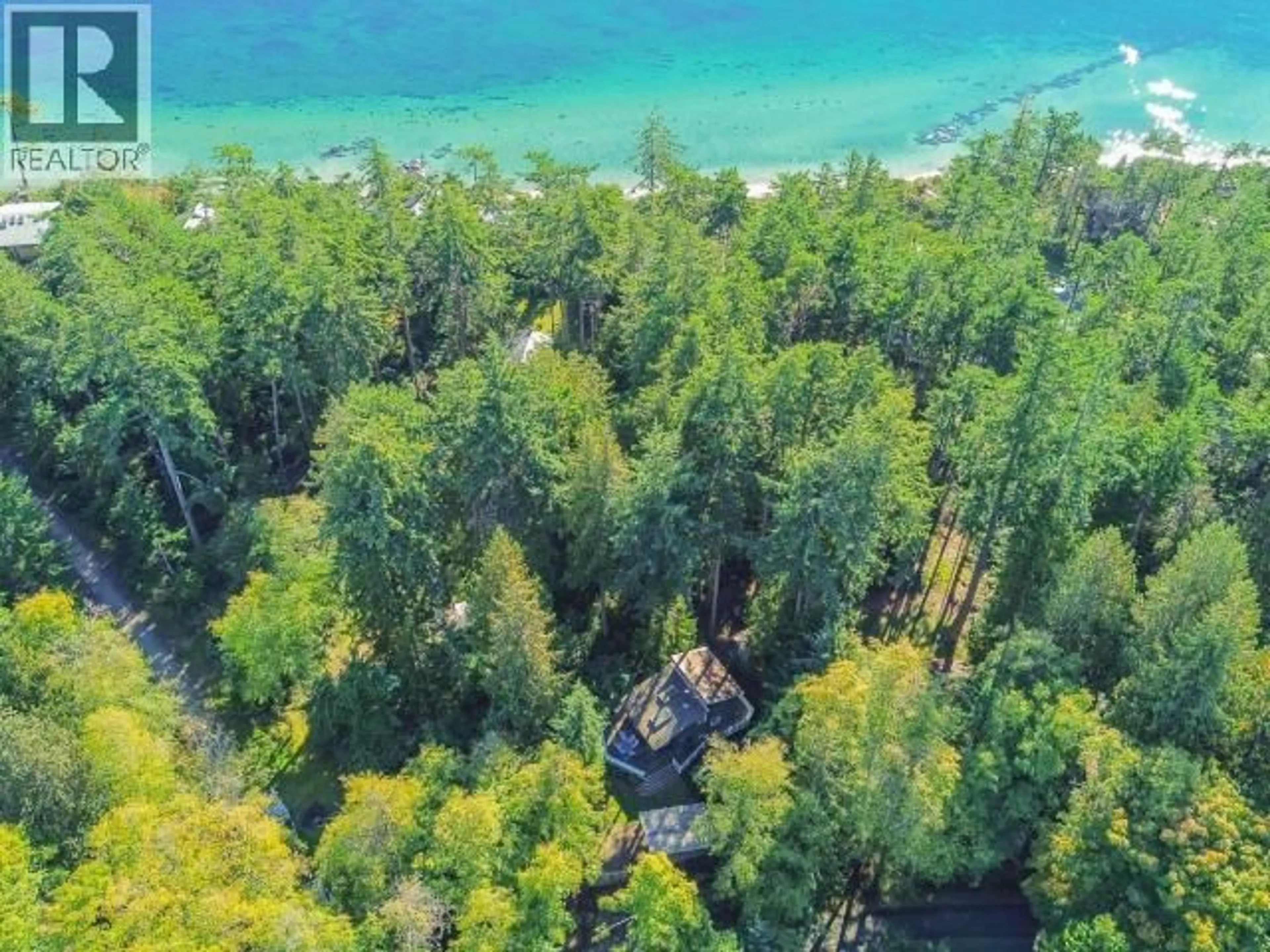 A pic from outside/outdoor area/front of a property/back of a property/a pic from drone, water/lake/river/ocean view for 2742 VANCOUVER BLVD, Savary Island British Columbia V0N2G0