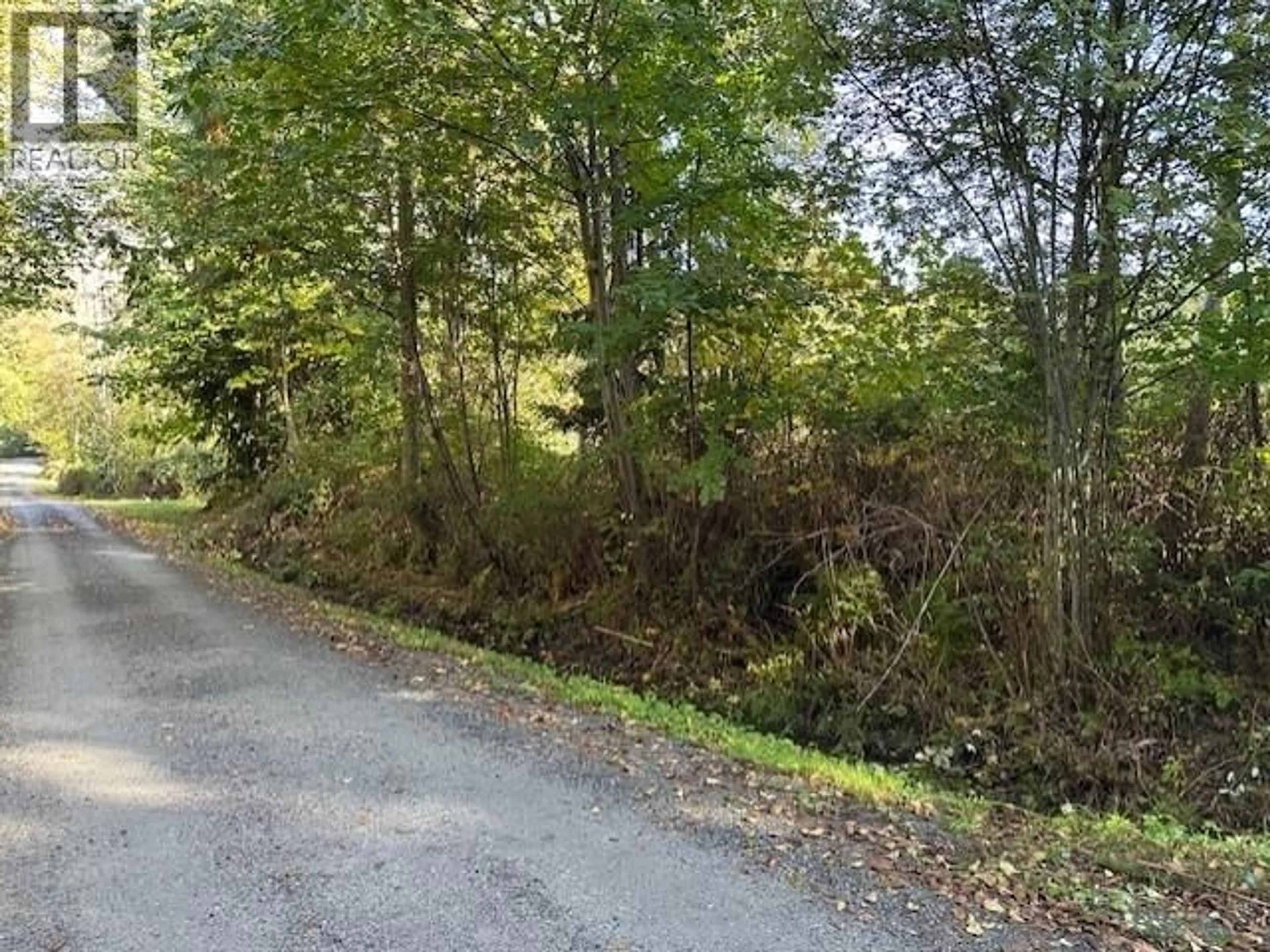 A pic from outside/outdoor area/front of a property/back of a property/a pic from drone, forest/trees view for 5628 TANNER AVE, Powell River British Columbia