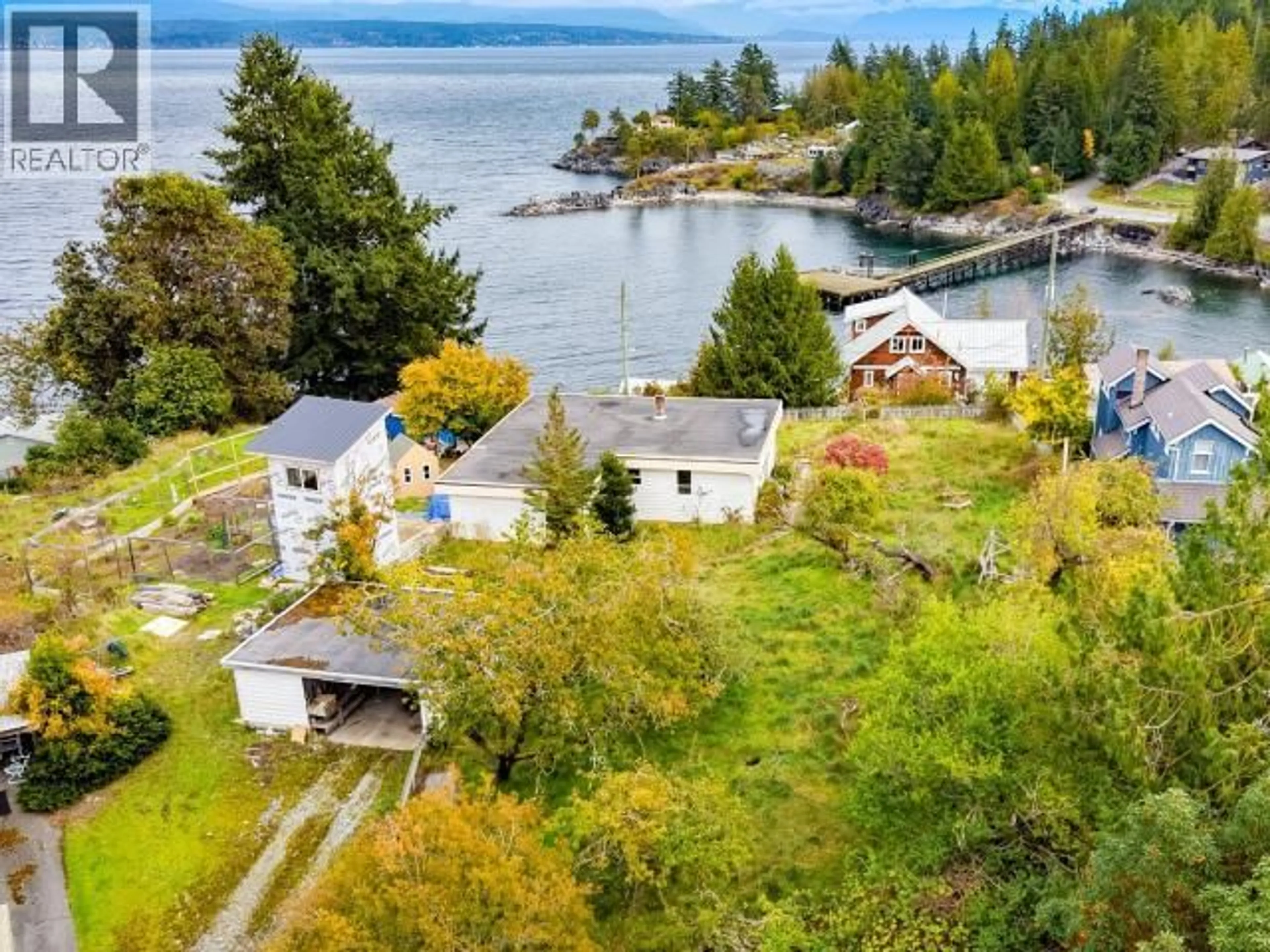 A pic from outside/outdoor area/front of a property/back of a property/a pic from drone, water/lake/river/ocean view for 5358 EARL STREET, Texada Island British Columbia V0N3K0