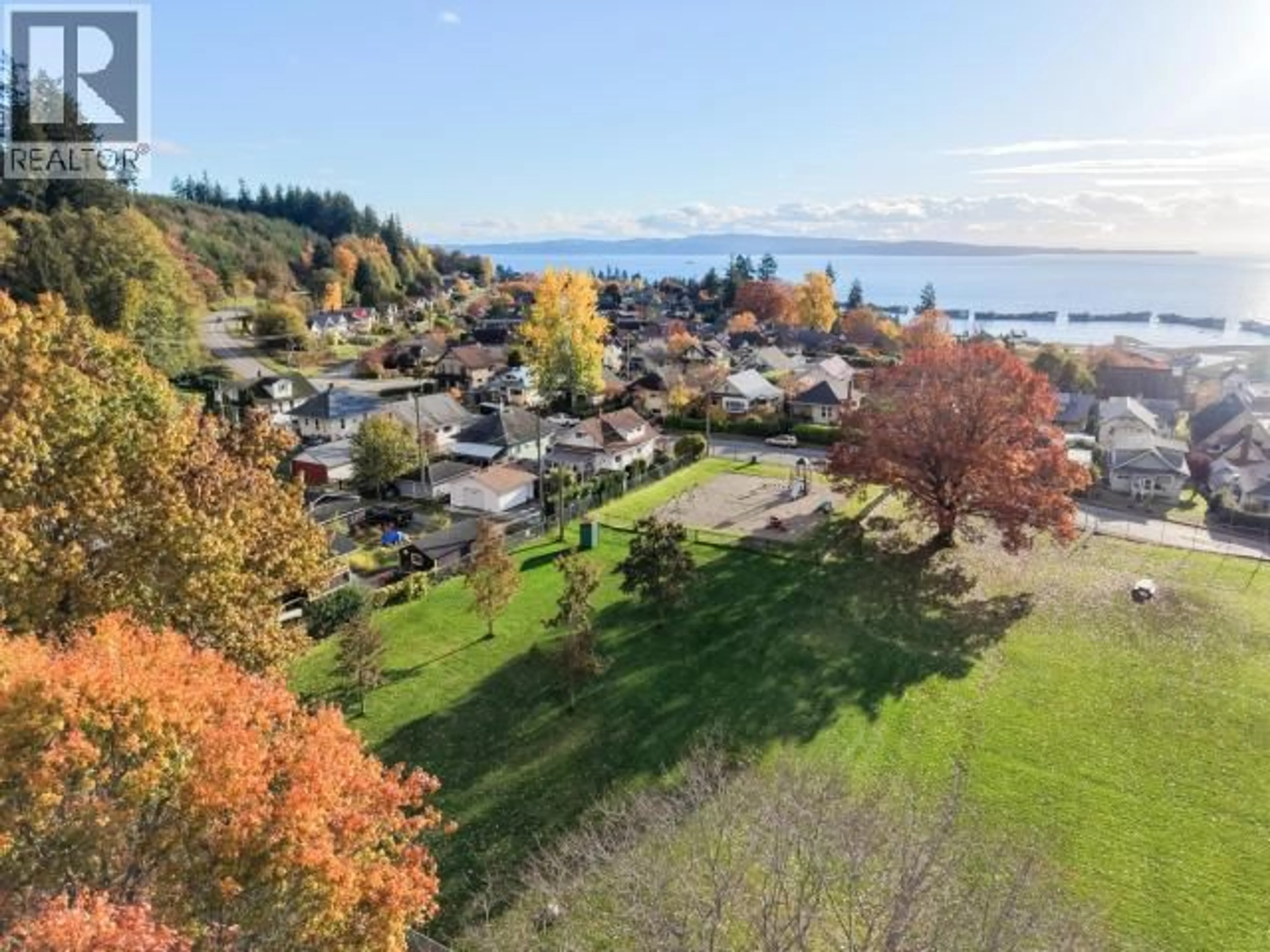 A pic from outside/outdoor area/front of a property/back of a property/a pic from drone, water/lake/river/ocean view for 6345 POPLAR STREET, Powell River British Columbia V8A4L5