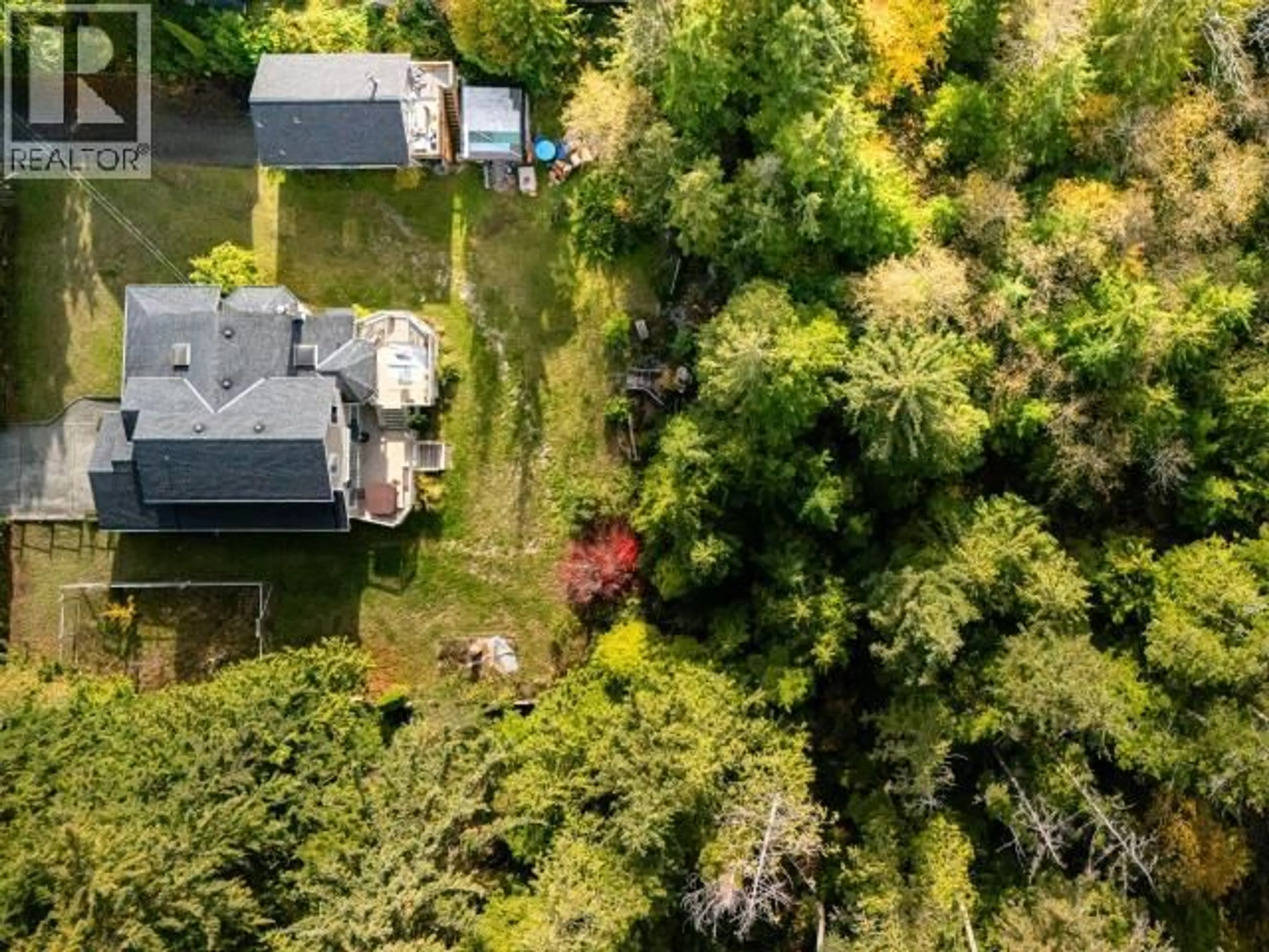 A pic from outside/outdoor area/front of a property/back of a property/a pic from drone, forest/trees view for 4989 FERNWOOD AVE, Powell River British Columbia V8A3L9