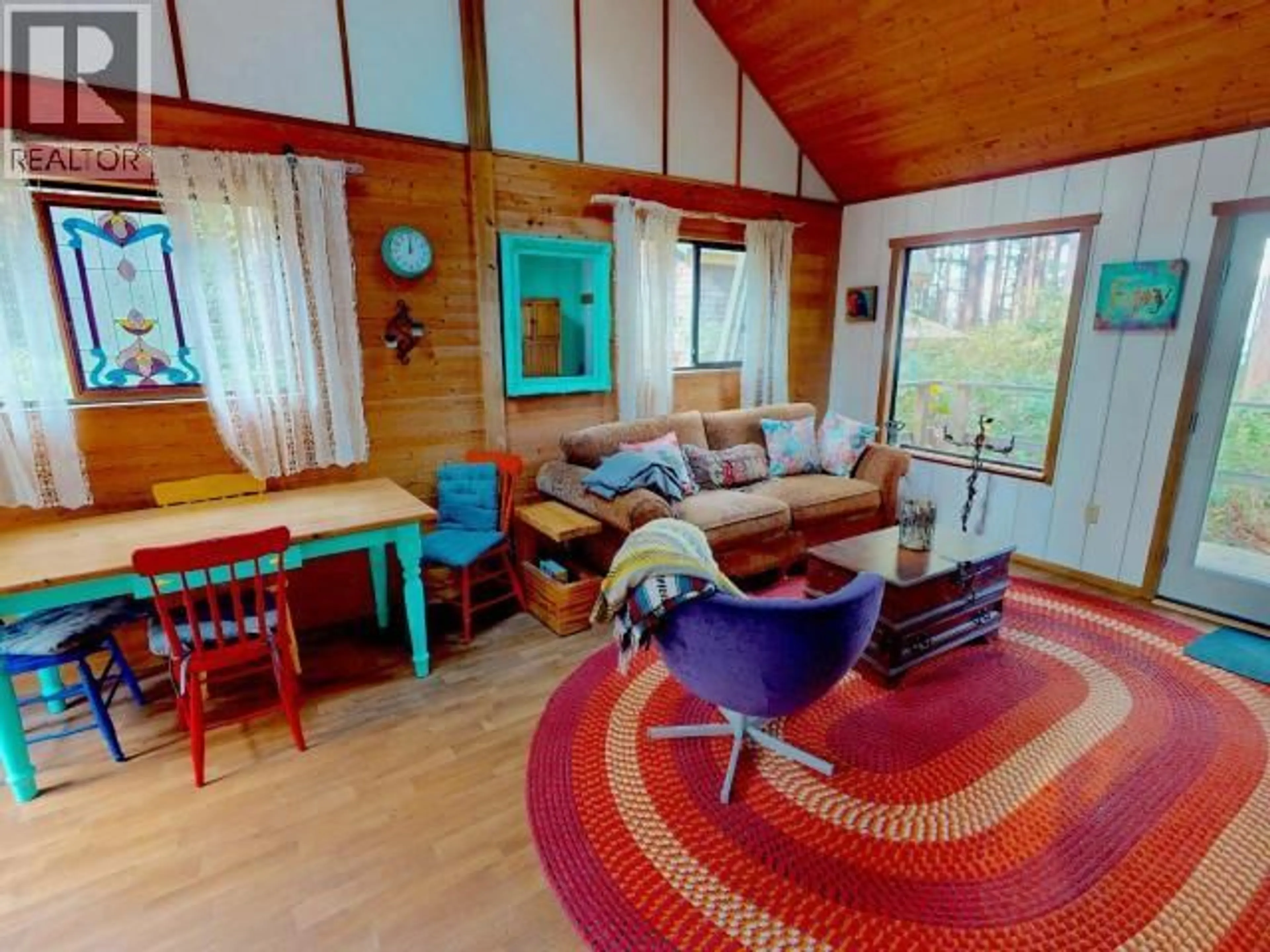 Living room with furniture, wood/laminate floor for 1623 VANCOUVER BLVD, Savary Island British Columbia V0N2G0
